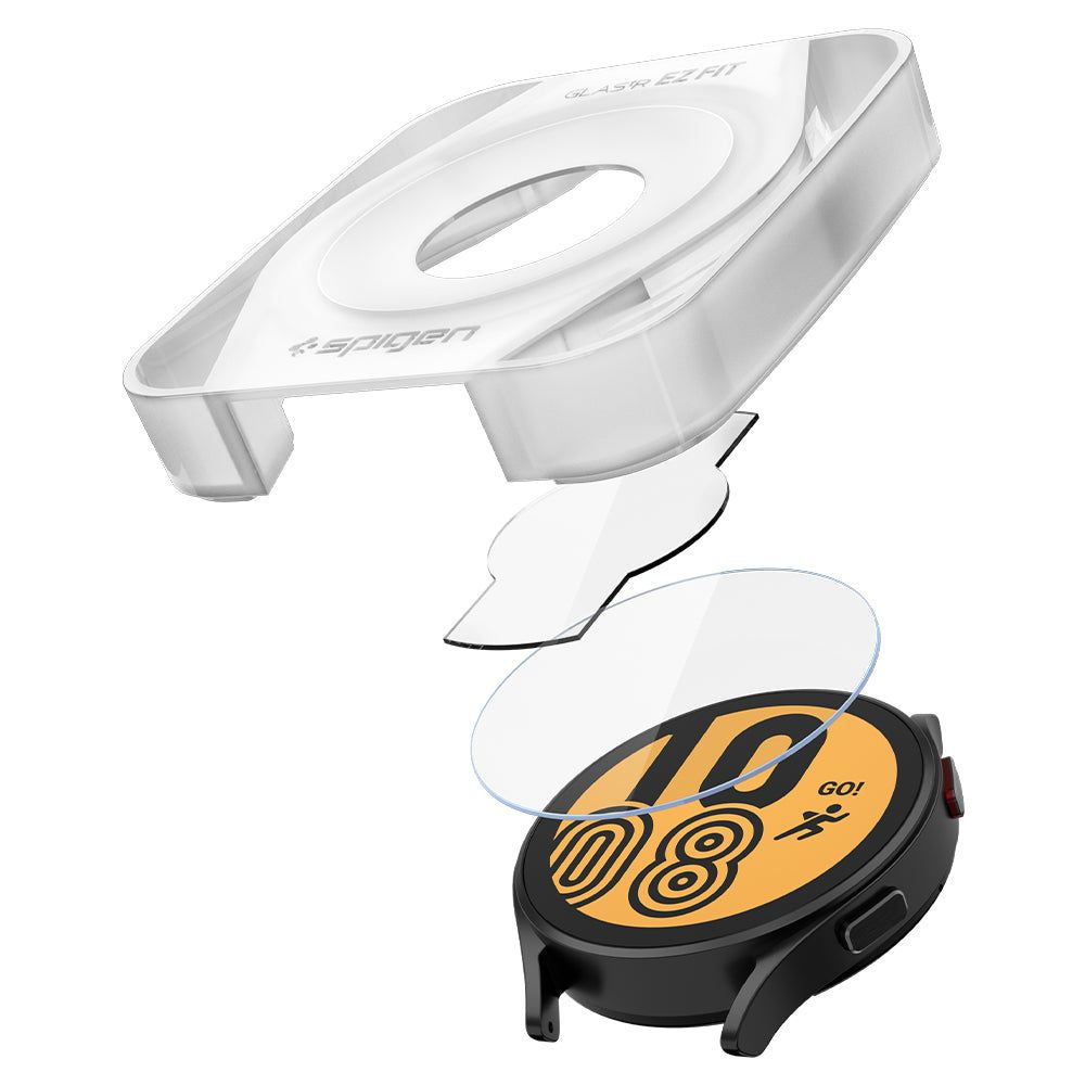 Vista esplosa di uno smartwatch con protezione schermo e strumento di installazione. Orologio nero con schermo arancione e accessori bianchi.