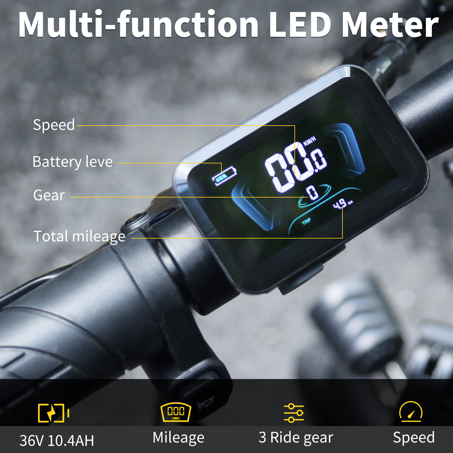 Zbliżenie wielofunkcyjnego miernika LED na rowerze. Wyświetlacz pokazuje prędkość, baterię, bieg i przebieg.