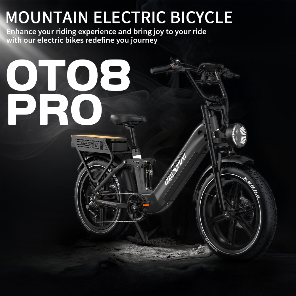 Una bicicleta eléctrica negra, OT08 PRO, con texto blanco, sobre un fondo oscuro. Los neumáticos tienen escrito KENDA.
