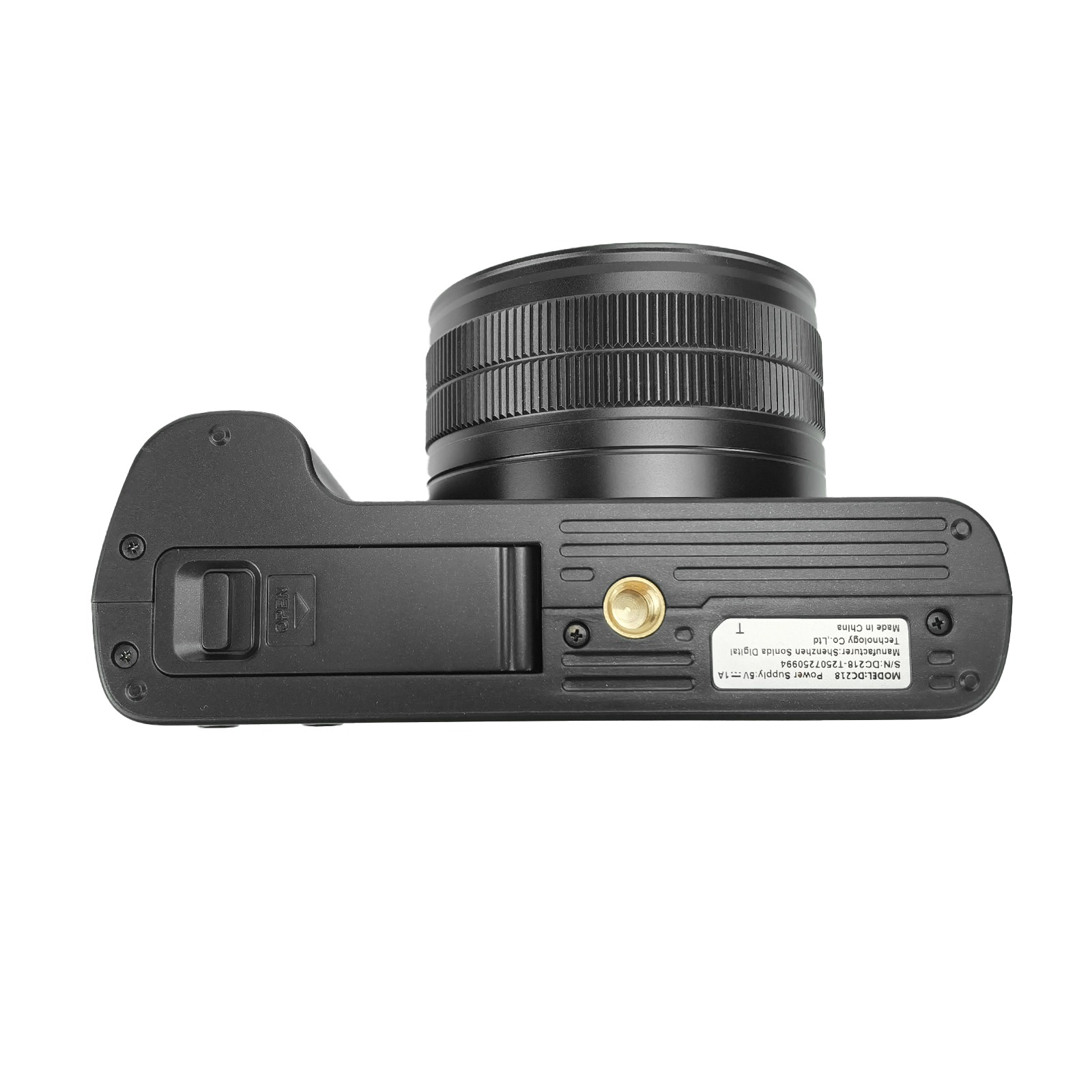 Czarny aparat na białej powierzchni. Obiektyw na górze, na dole model i producent.