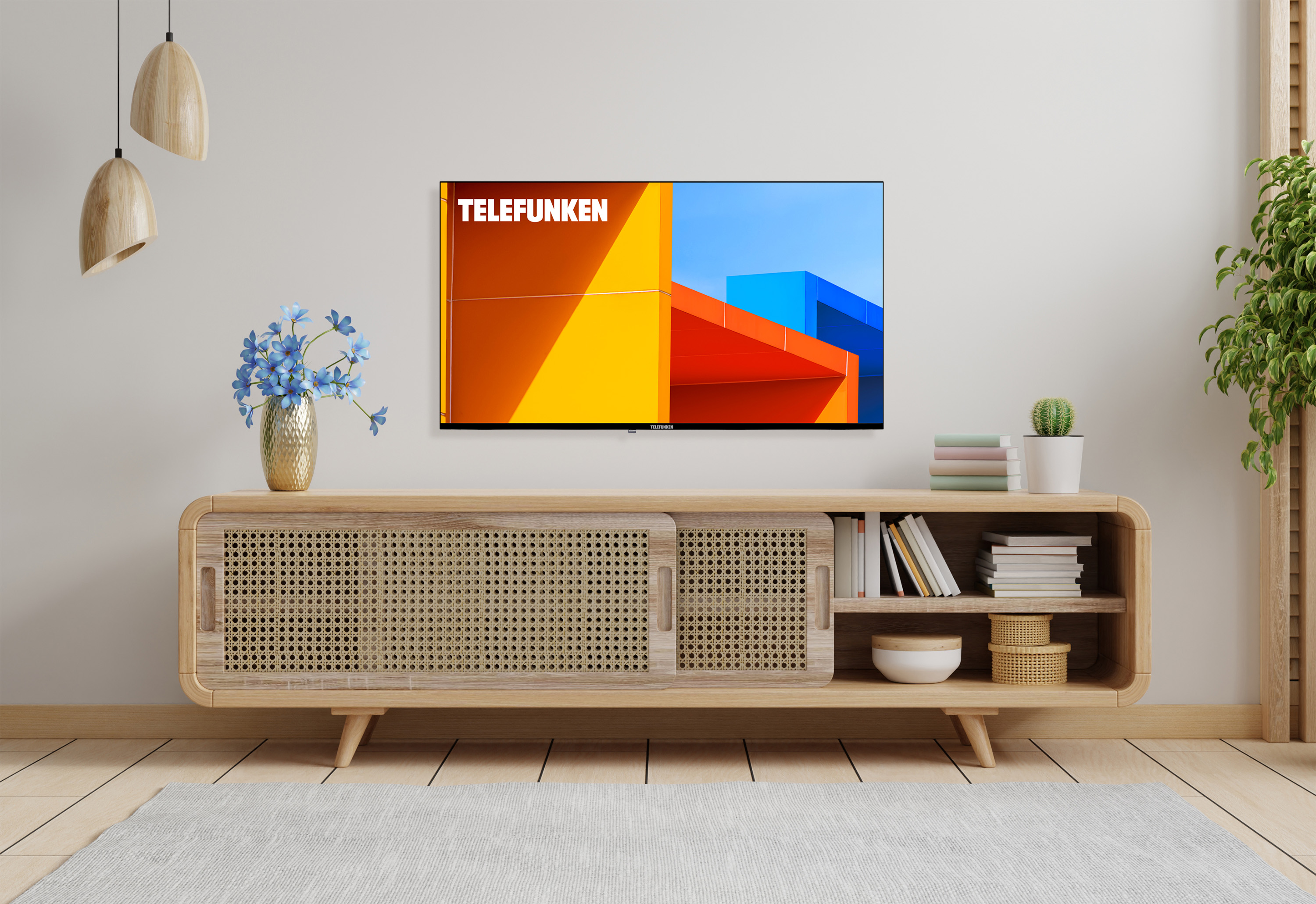 Salón con televisor que muestra arte abstracto colorido. Un mueble de madera contiene libros, plantas y decoración.
