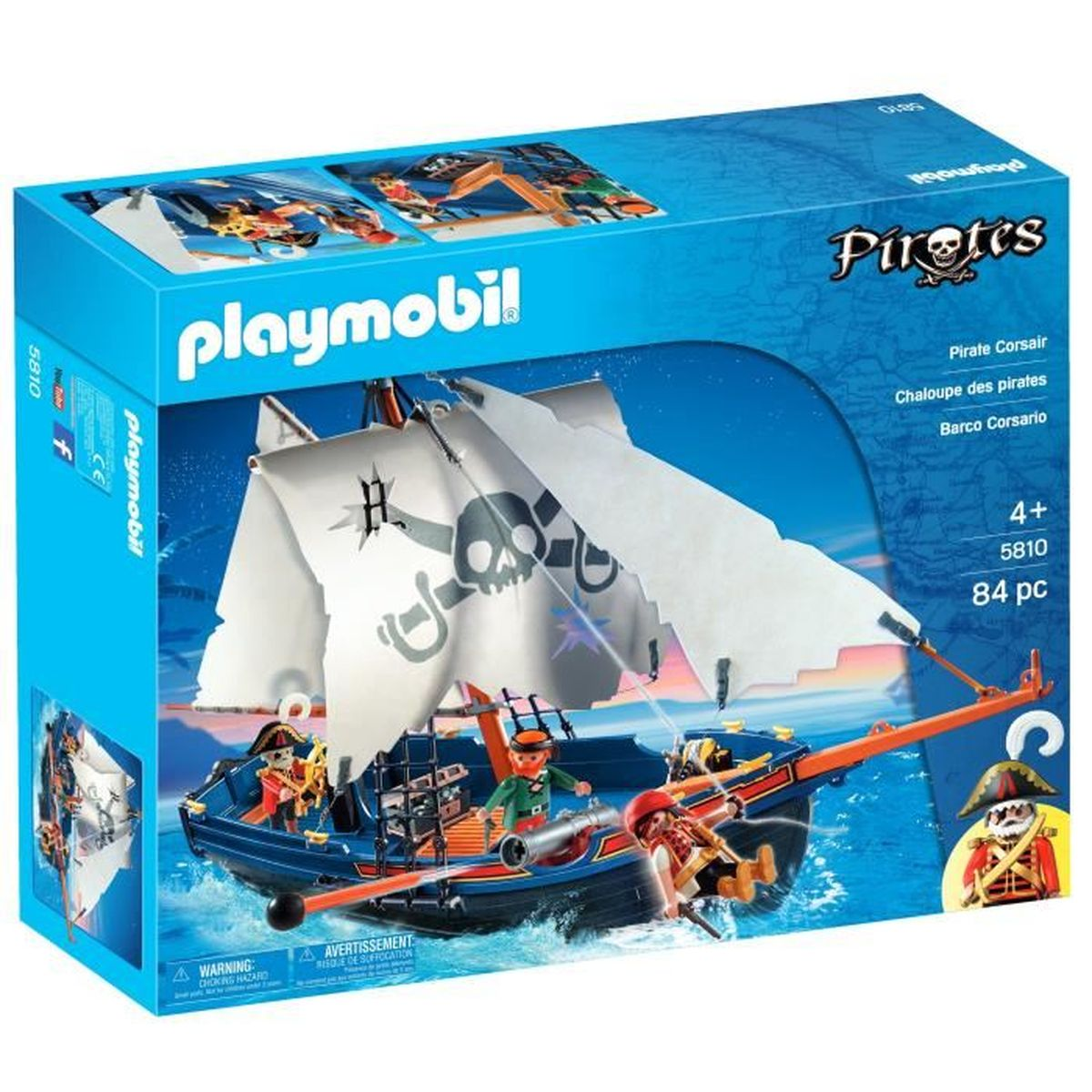 Scatola della nave pirata Playmobil. Nave blu con vele bianche, teschio. Pirati a bordo. La scatola ha testo e immagini.