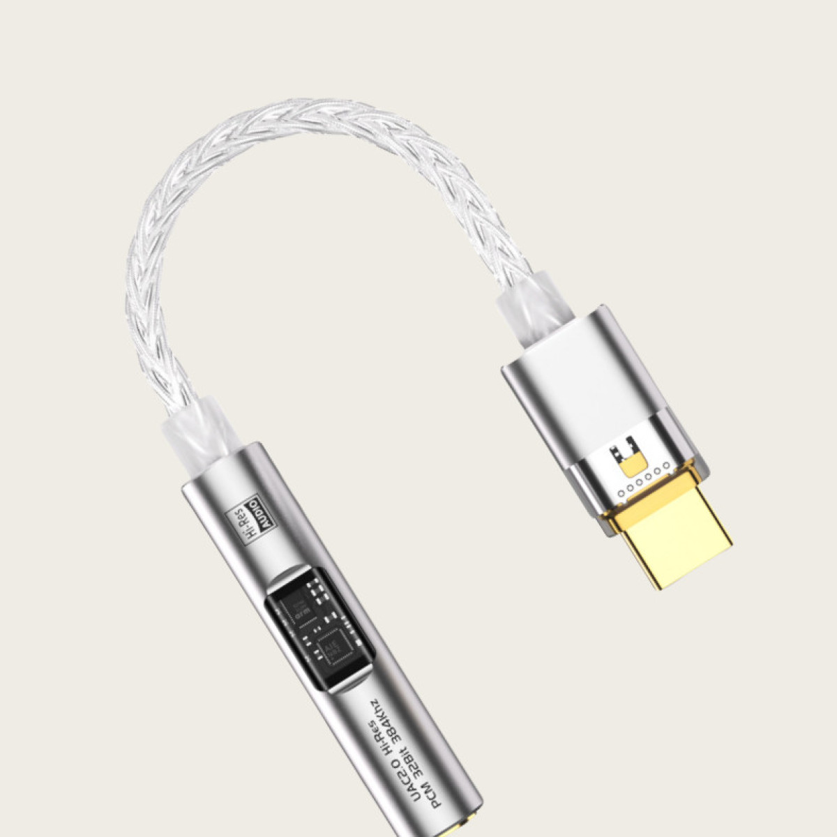 Srebrny adapter audio ze złotym złączem USB-C i plecionym srebrnym kablem. Tekst: UAC2.0 Hi-Res PCM 32Bit 384kHz.