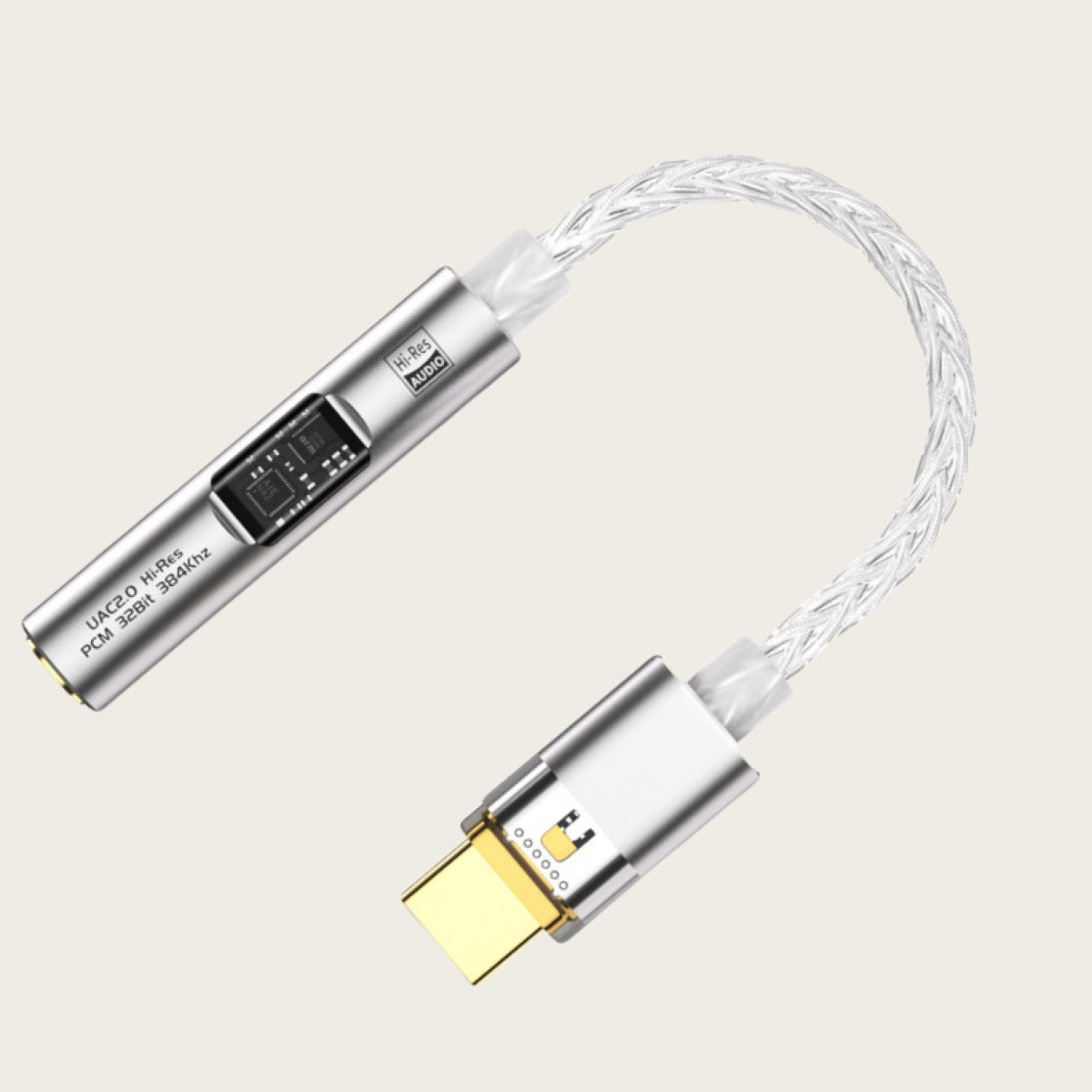 Srebrny adapter audio ze złotym złączem USB-C i plecionym kablem. Posiada logo 'Hi-Res Audio' i szczegóły techniczne.