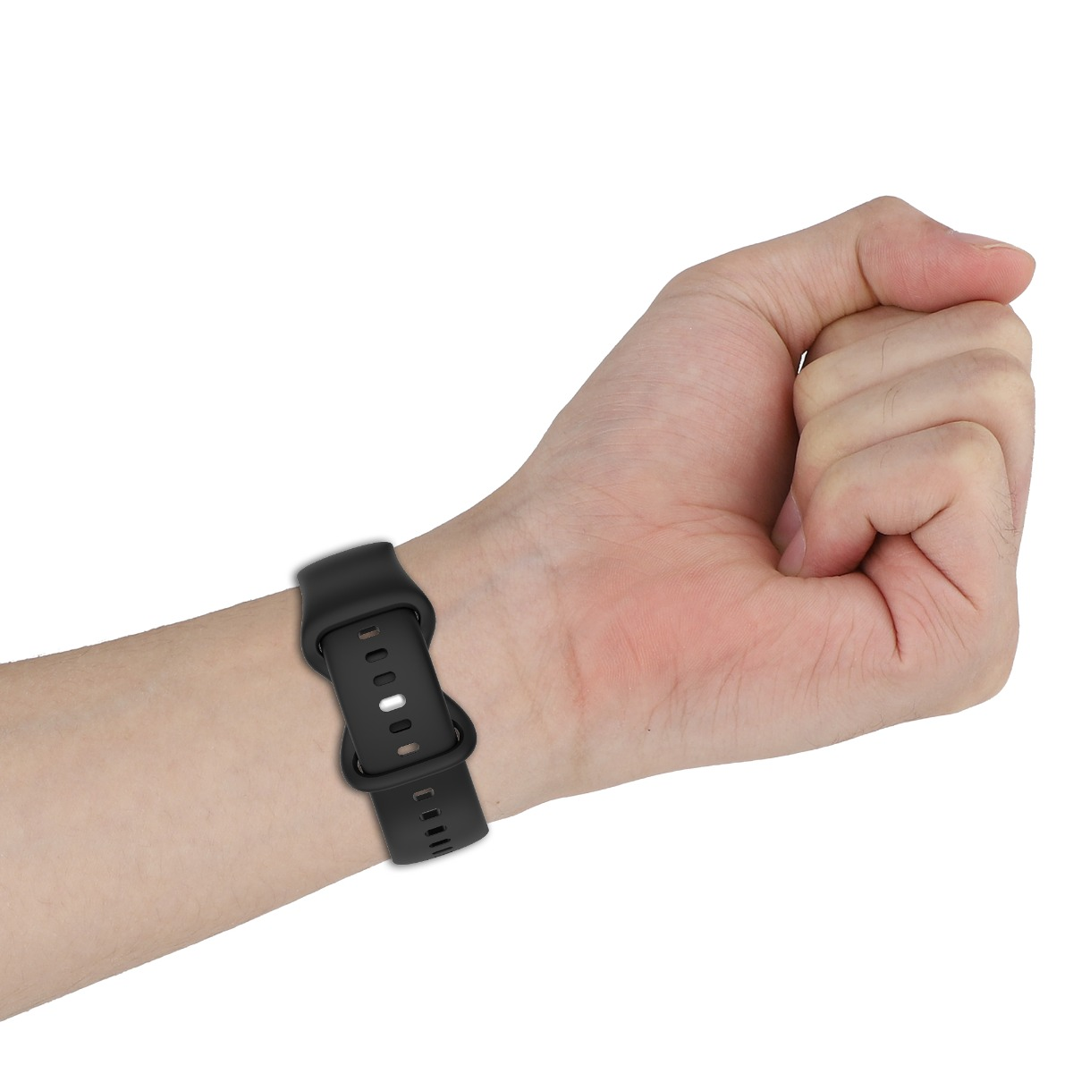 Eine Hand mit einem schwarzen Armband ist abgebildet. Die Hand ist zu einer Faust geballt, das Band am Handgelenk befestigt.