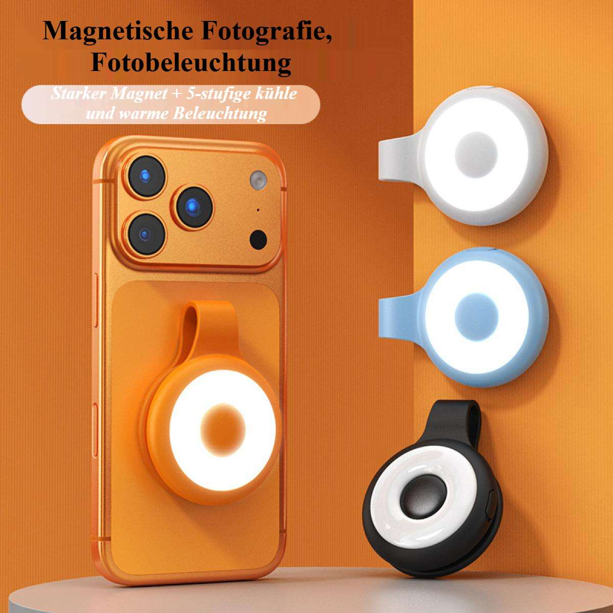 Ein orangefarbenes Telefon mit einem Ringlicht und drei weiteren Ringlichtern in Weiß, Blau und Schwarz.