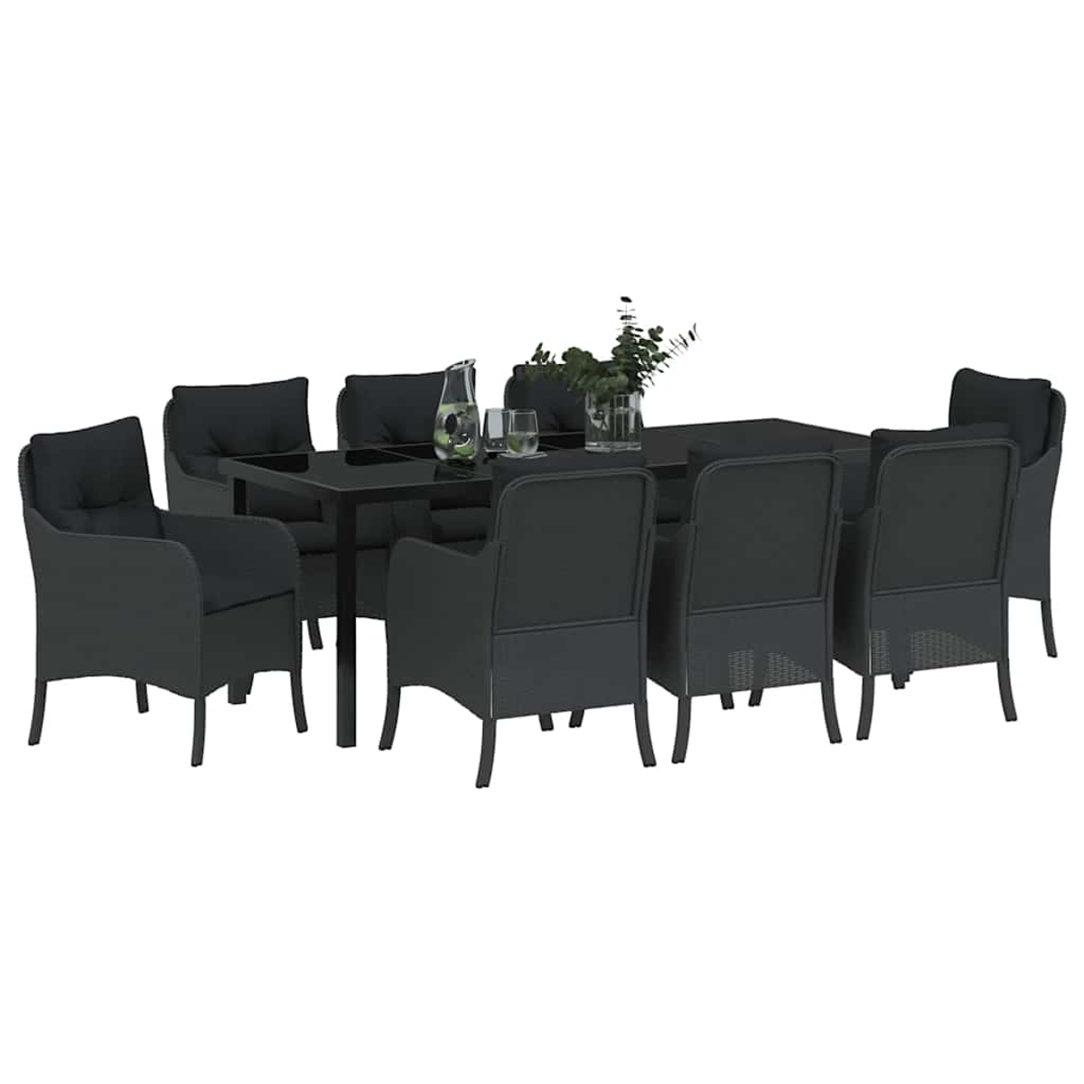 Ein dunkelgraues Ess-Set mit acht Stühlen um einen rechteckigen Tisch. Auf dem Tisch stehen ein Krug, Gläser und Pflanzen.
