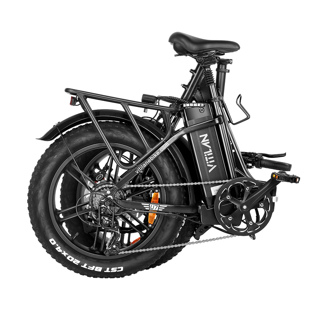 Bicicleta eléctrica plegable negra. Características incluyen neumáticos anchos, portaequipajes y batería con marca 'Vitilan'.