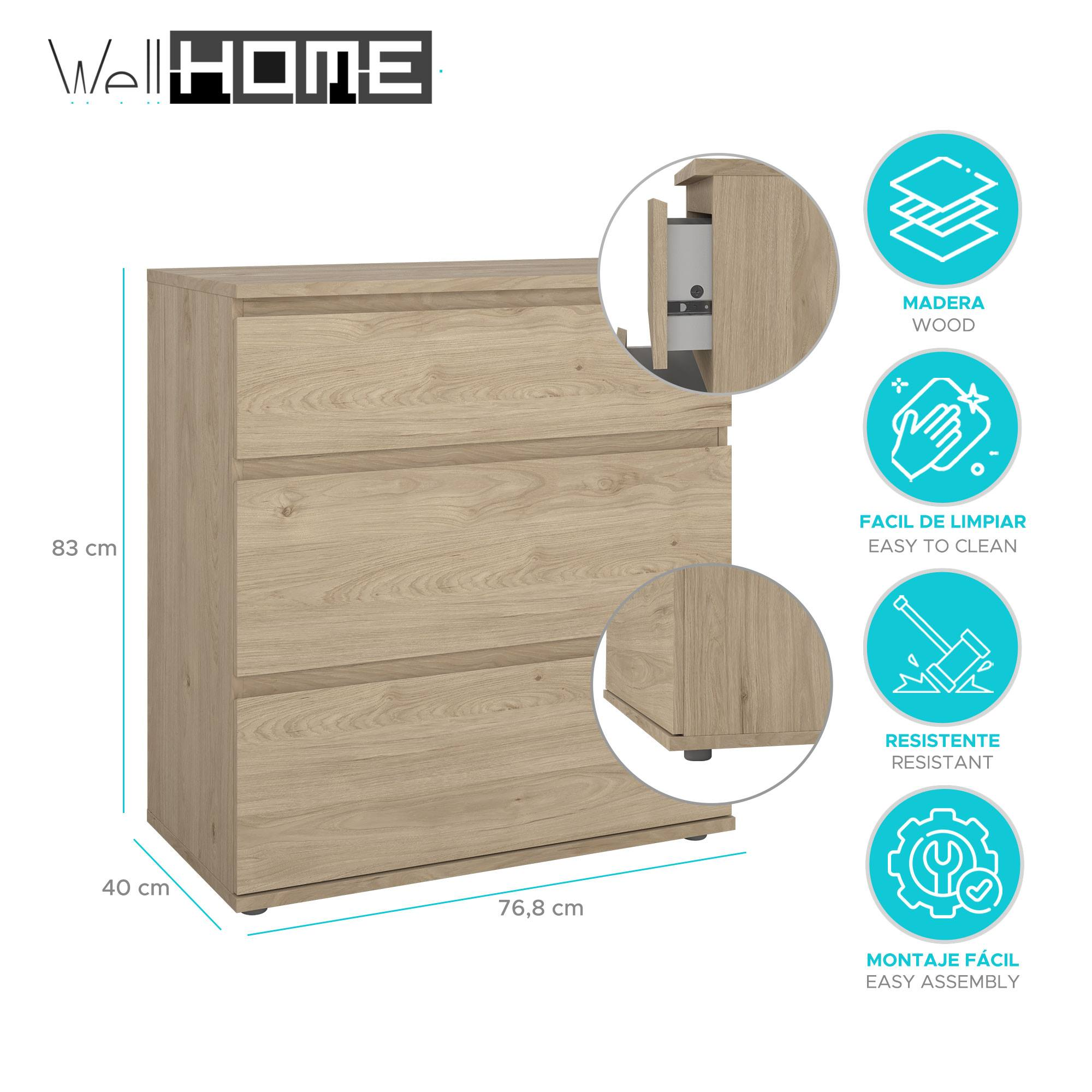 Un cómoda de madera clara. Tiene tres cajones, uno parcialmente abierto. Se muestran las dimensiones.