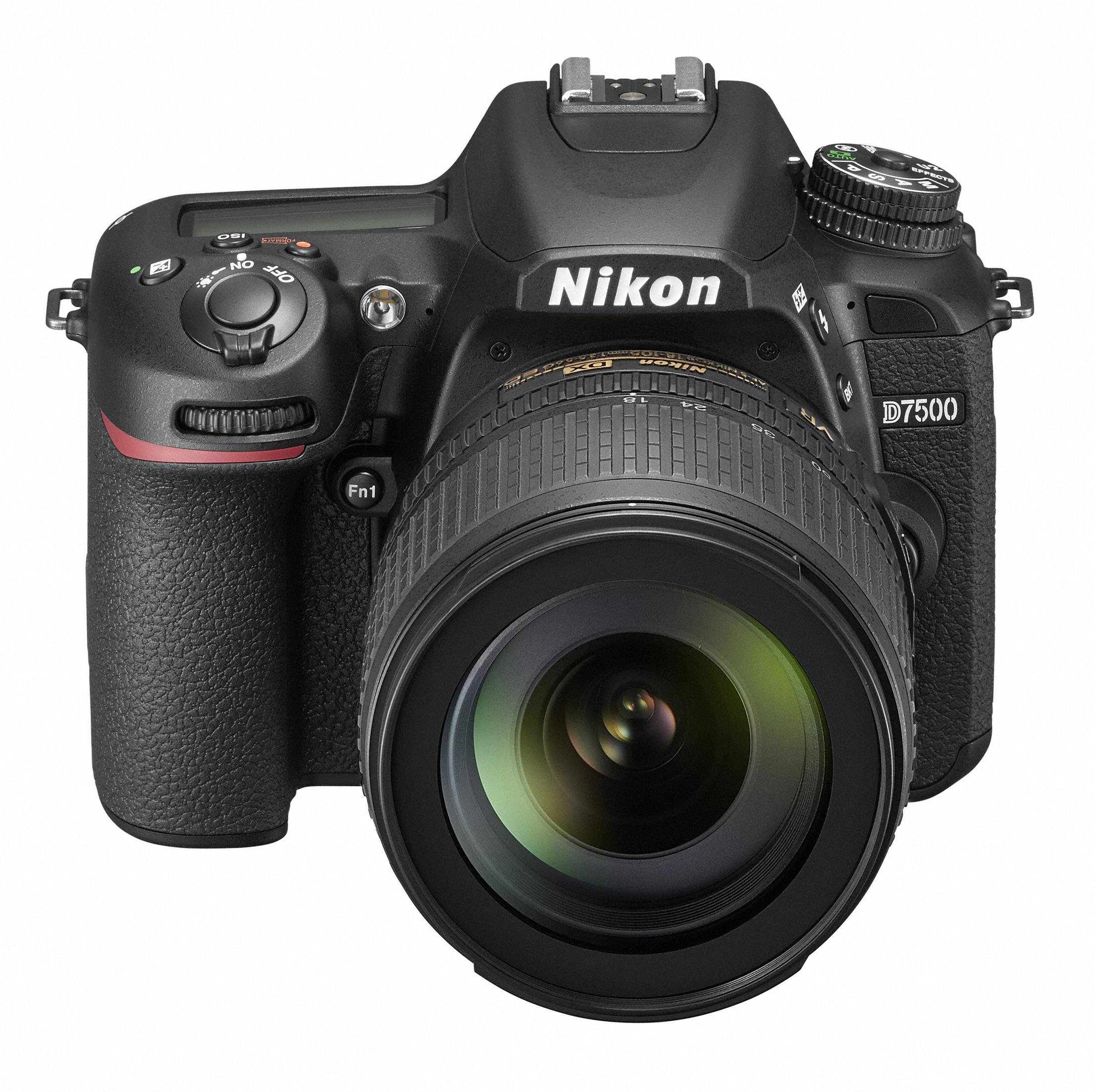 Cámara negra Nikon D7500 con lente. Tiene botones, diales y el logotipo de Nikon. El fondo es blanco.