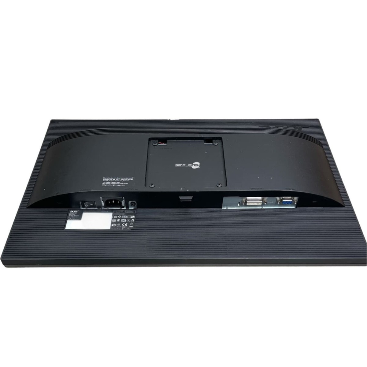È mostrato il retro di un monitor Acer nero. Sono presenti porte, un ingresso di alimentazione e un'etichetta SimpleTek. Il monitor poggia su una superficie bianca.
