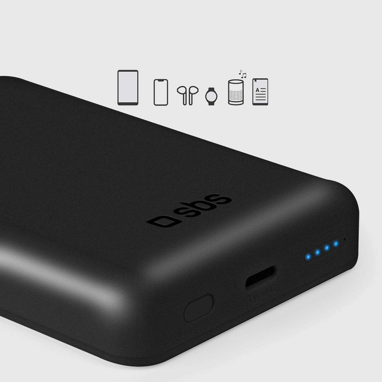 Czarny power bank z logo SBS. U góry znajdują się ikony urządzeń, takich jak telefony, słuchawki i zegarek. Widoczne niebieskie światła.