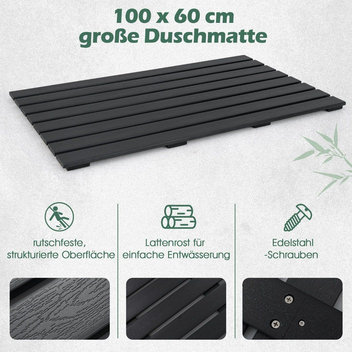 Una alfombra de ducha gris oscuro. Es rectangular con un diseño de listones y se anuncia como antideslizante. El texto describe características.