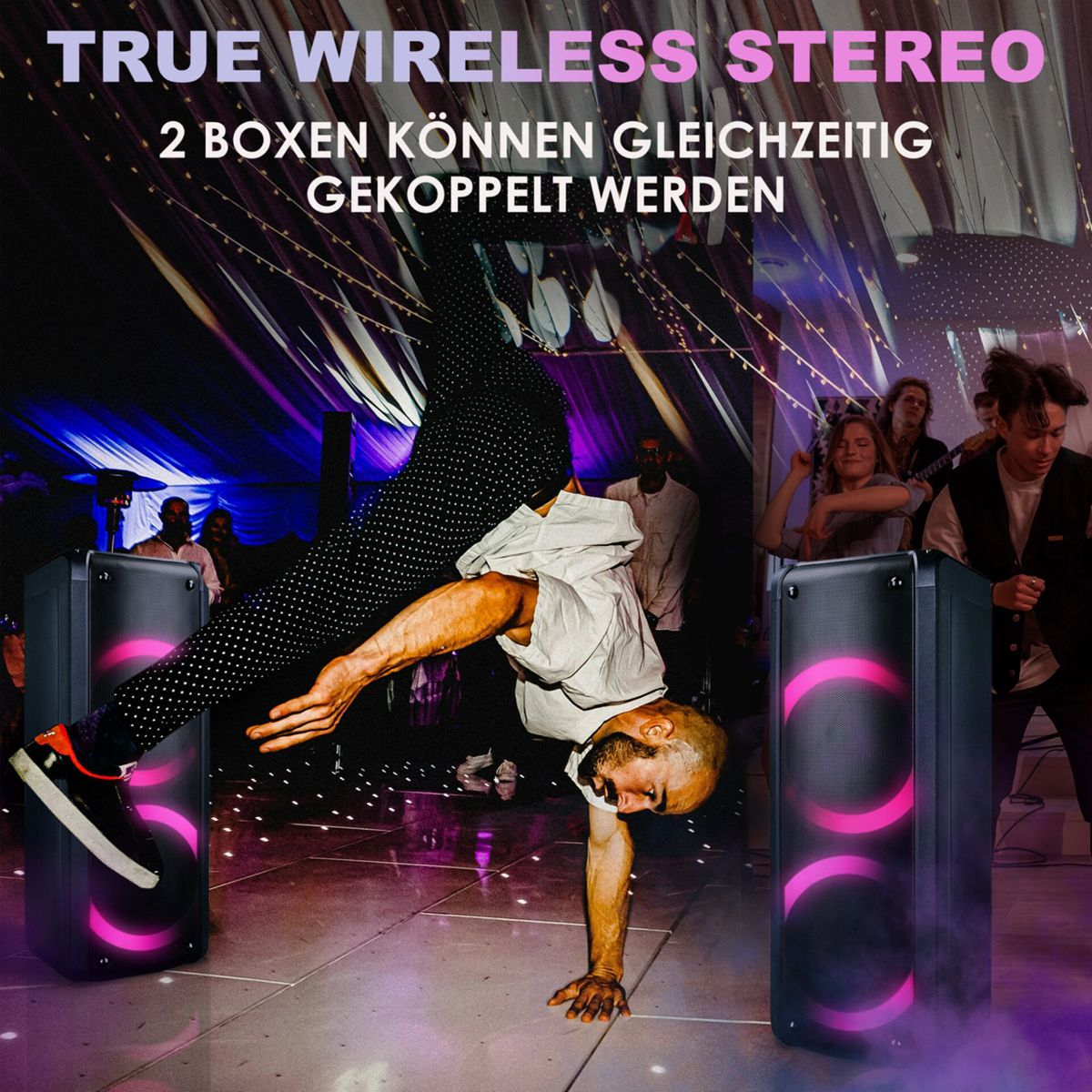 Ein Mann macht einen Handstand in der Nähe von zwei Lautsprechern. Partygäste tanzen im Hintergrund. Die Lautsprecher haben pinkfarbene Kreise.
