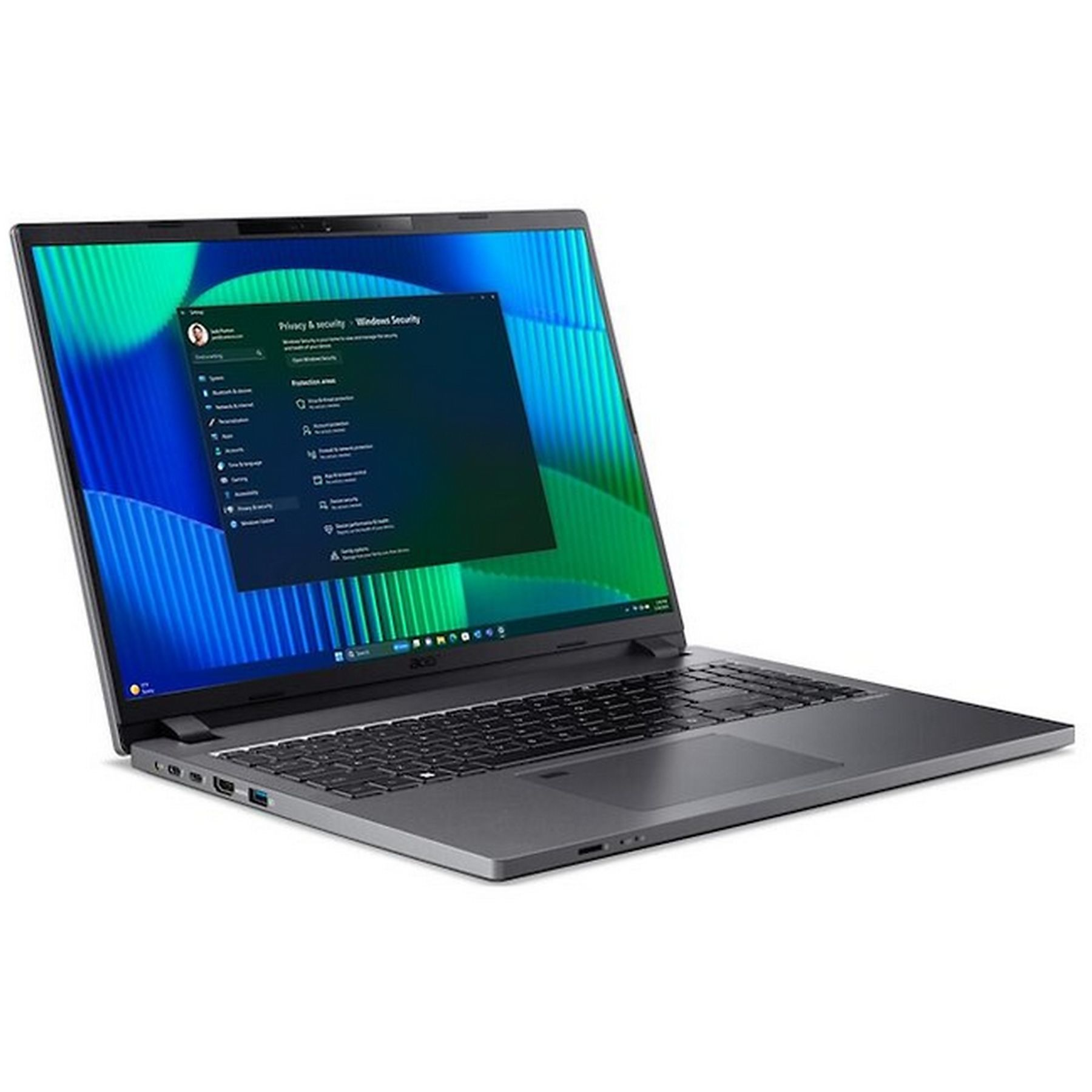 Un laptop Acer grigio è aperto, che mostra le impostazioni di Sicurezza di Windows. Lo schermo mostra le opzioni di privacy e sicurezza.