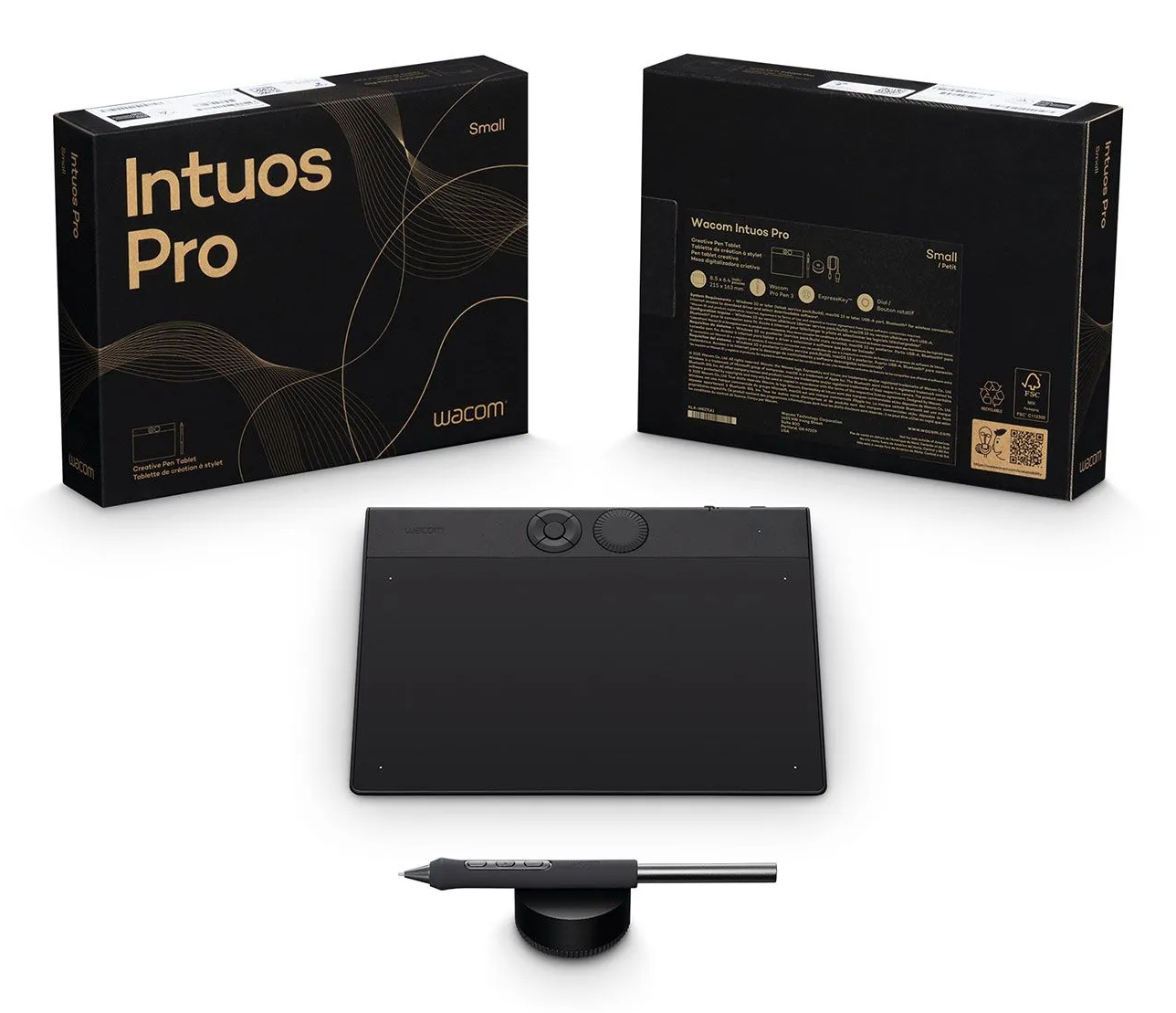 Ein Wacom Intuos Pro Tablet, Stift und Boxen sind angeordnet. Boxen zeigen 'Intuos Pro' und 'Wacom'. Das Tablet und der Stift sind schwarz.