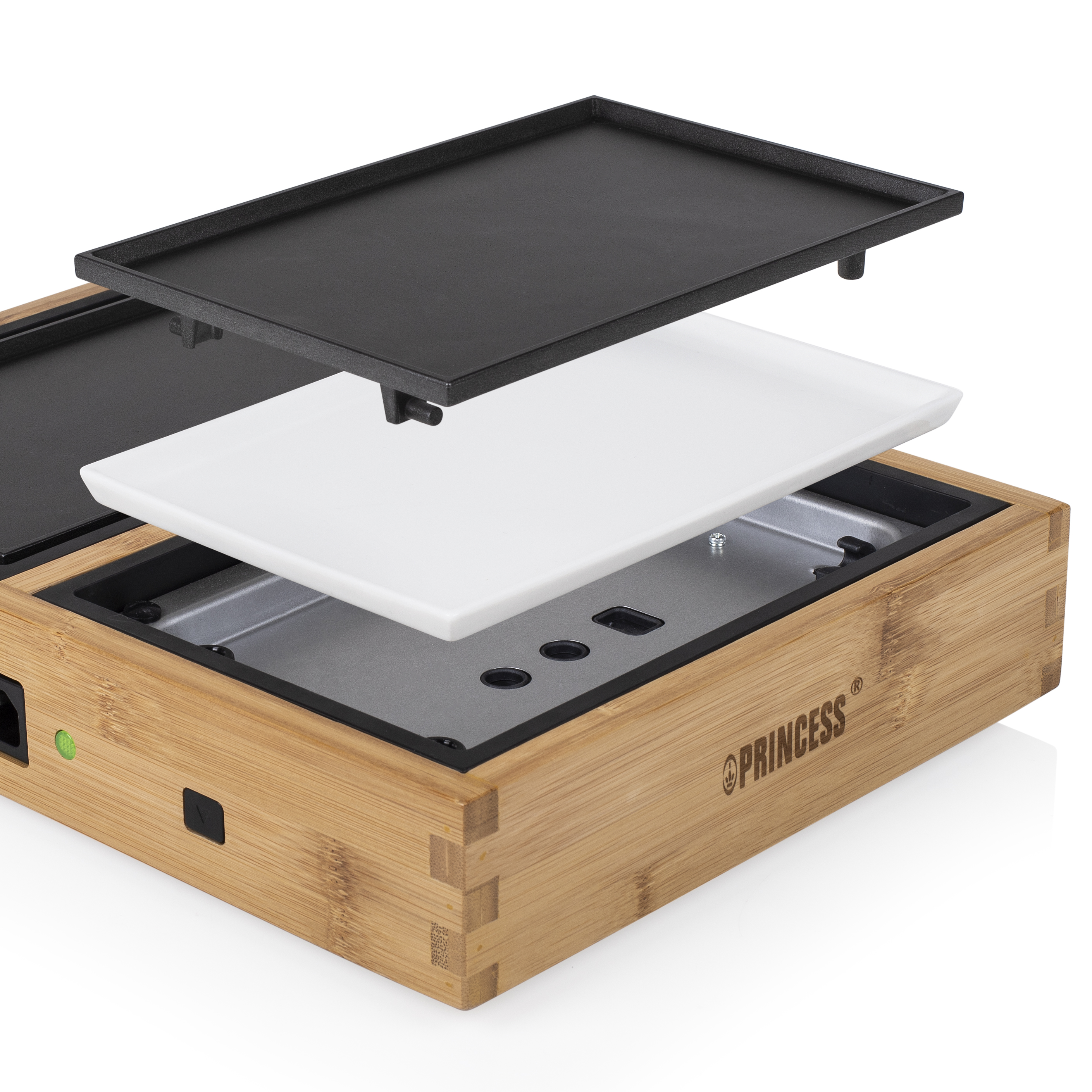 Griglia per raclette in bambù con piastra nera rimovibile e superficie di cottura bianca, parti separate.