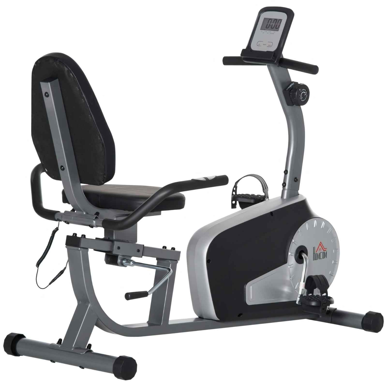 Ein Liege-Heimtrainer. Es hat einen Sitz, Pedale und einen Bildschirm. Der Rahmen ist grau und schwarz.