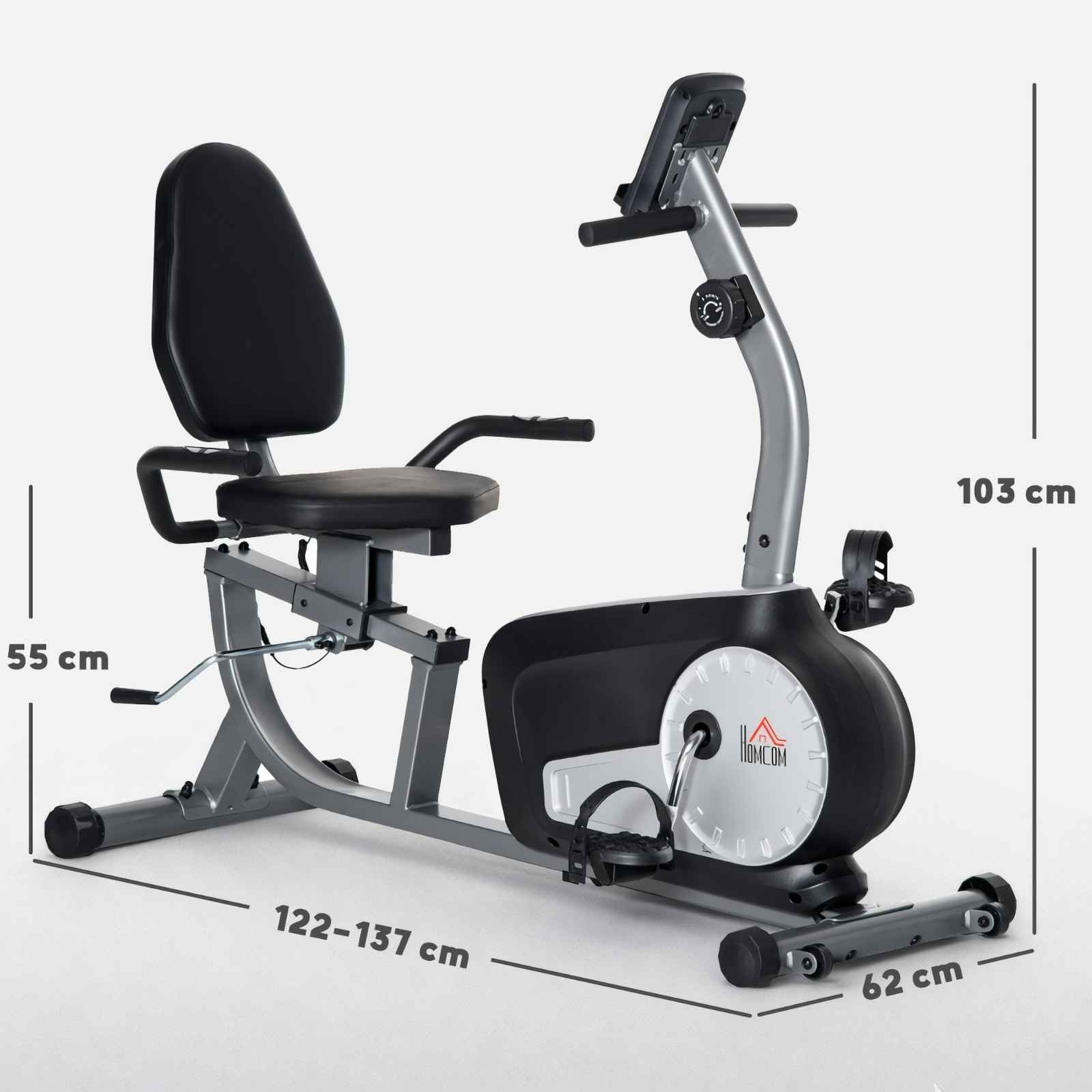 Heimtrainer. Schwarzer Sitz und Griffe, silberner Rahmen, schwarzes Radgehäuse. Abmessungen beschriftet.
