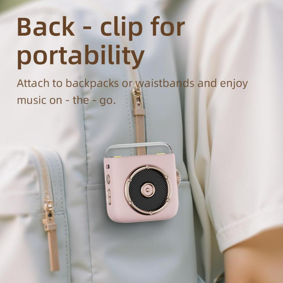 Ein rosafarbener Lautsprecher, der an einem Rucksack befestigt ist. Text: 'Rückseite - Clip für Portabilität'. Befestigung an Rucksäcken.