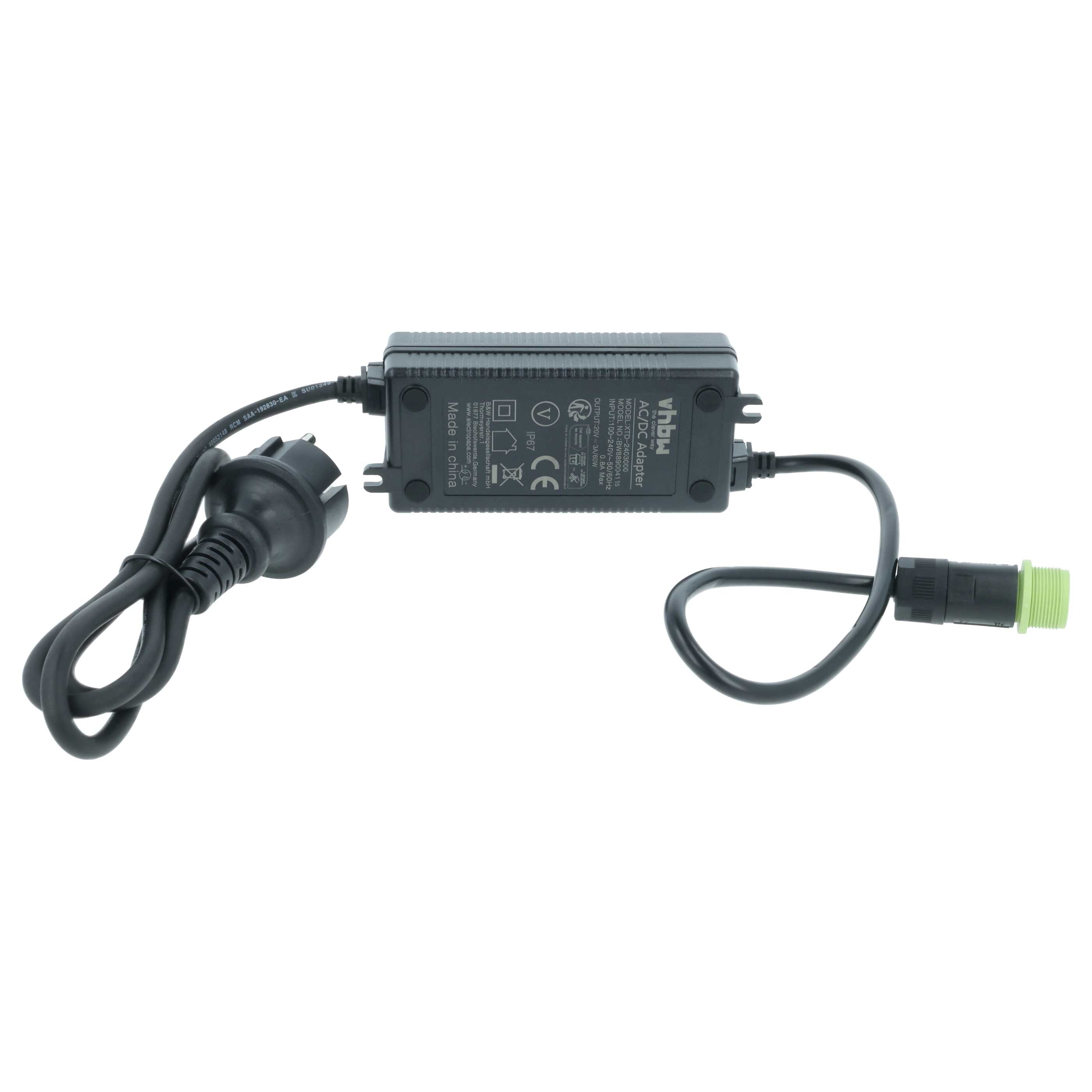 Ein AC/DC-Adapter mit schwarzem Gehäuse, Kabeln und einem Stecker. An einem Kabelende befindet sich ein grüner Stecker.