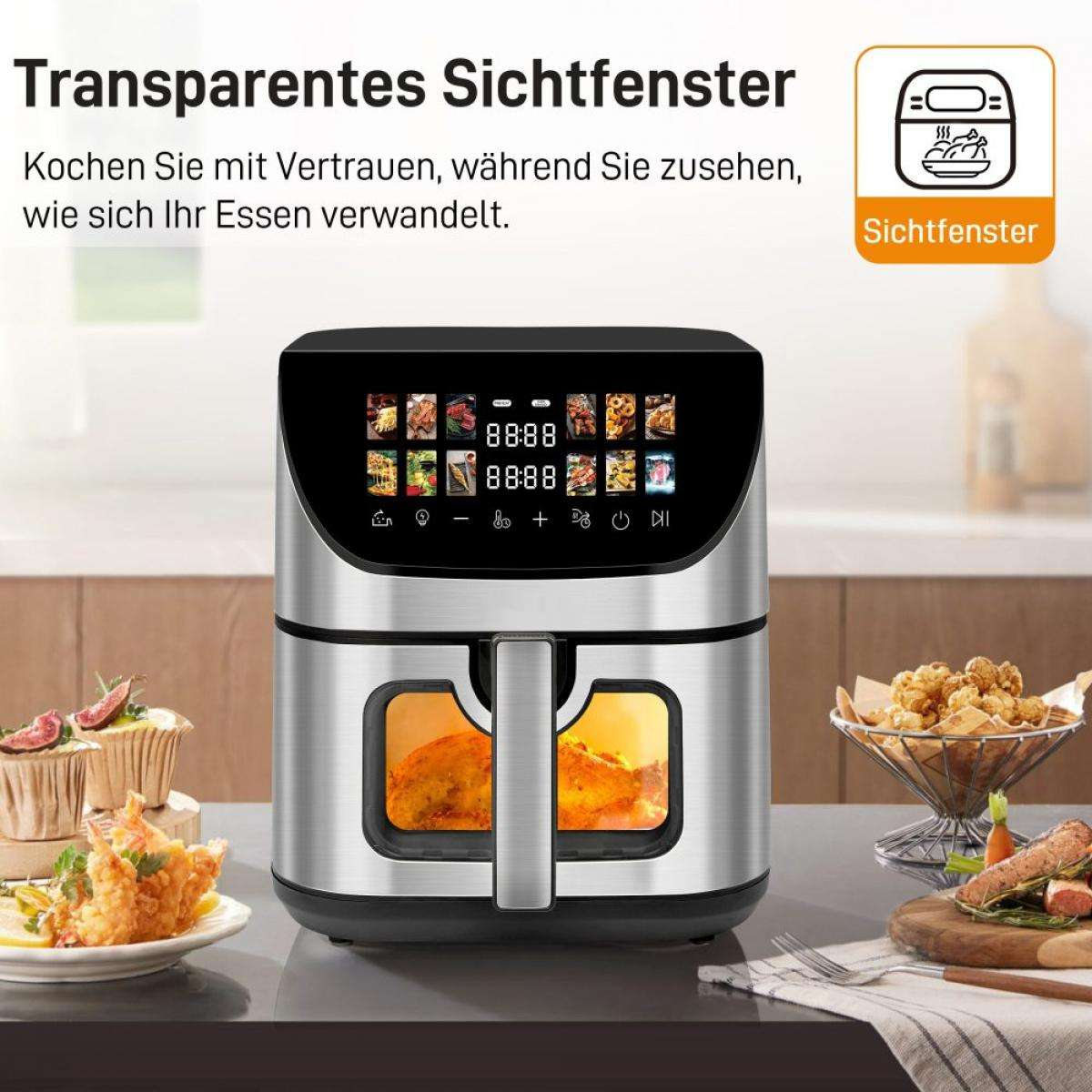 Ein Airfryer mit digitaler Anzeige, die die Zeit anzeigt. Essen ist durch das transparente Fenster sichtbar. Essen liegt auf der Theke.
