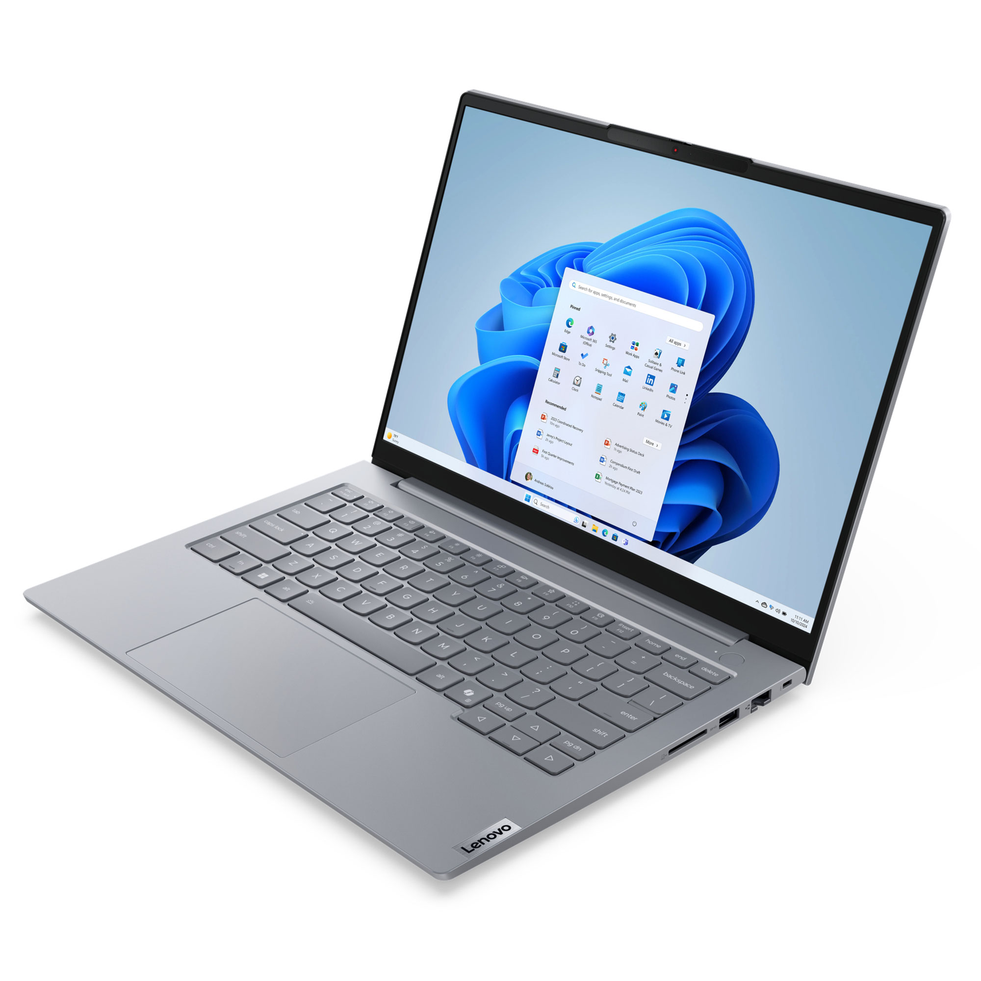 Gümüş renkli bir Lenovo dizüstü bilgisayar açık, Windows 11 arayüzünü gösteriyor. Klavye ve ekran görünür.
