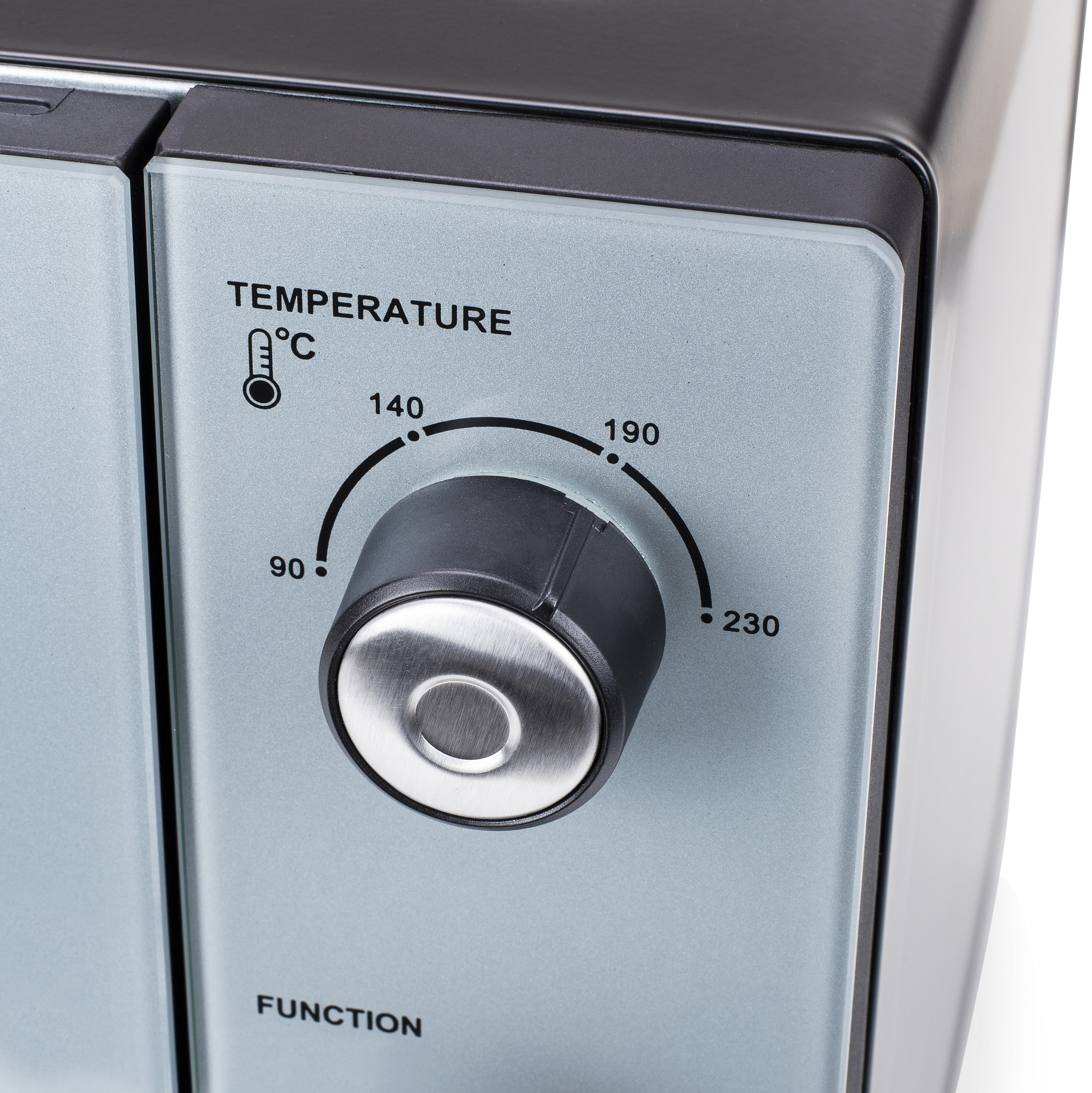 Primo piano di una manopola di controllo della temperatura su un elettrodomestico. Ha un quadrante con numeri e una scala di temperatura in Celsius.