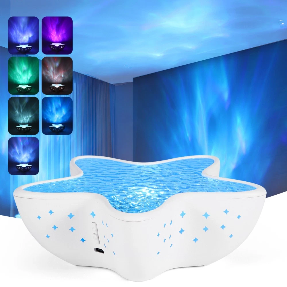 Ein sternförmiger weißer Lichtprojektor projiziert blaues Licht auf Decke und Wände, mit kleineren blauen Sternmustern auf dem Projektor.