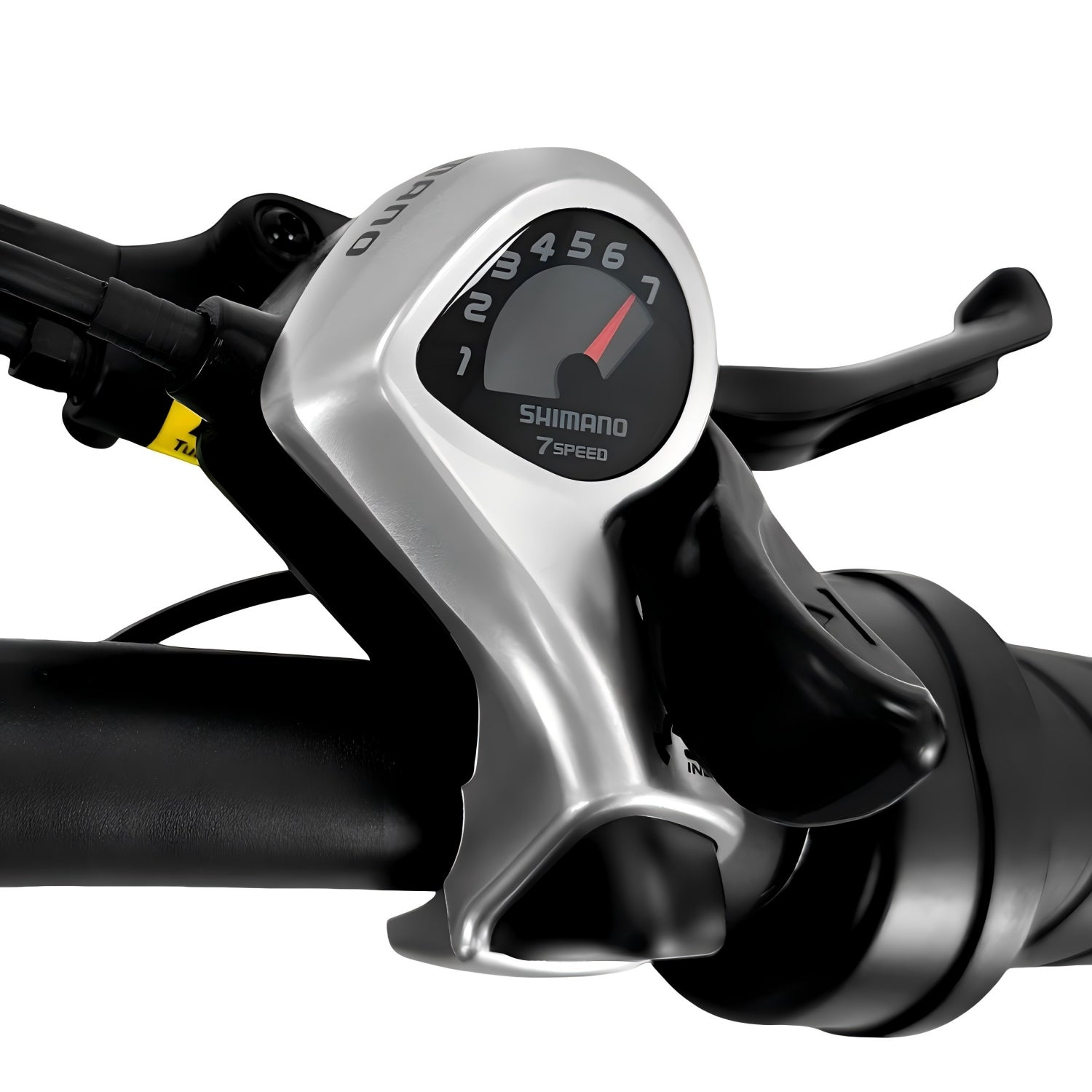 Nahaufnahme eines Fahrradlenkers mit einer Shimano 7-Gang-Ganganzeige, die '1' anzeigt. Schwarze Hebel und Lenker dominieren die Ansicht.