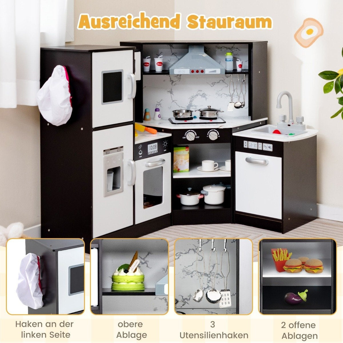 Una cocina de juguete para niños con refrigerador, horno, estufa, fregadero y armarios de almacenamiento. Tiene una combinación de colores blanco y negro.