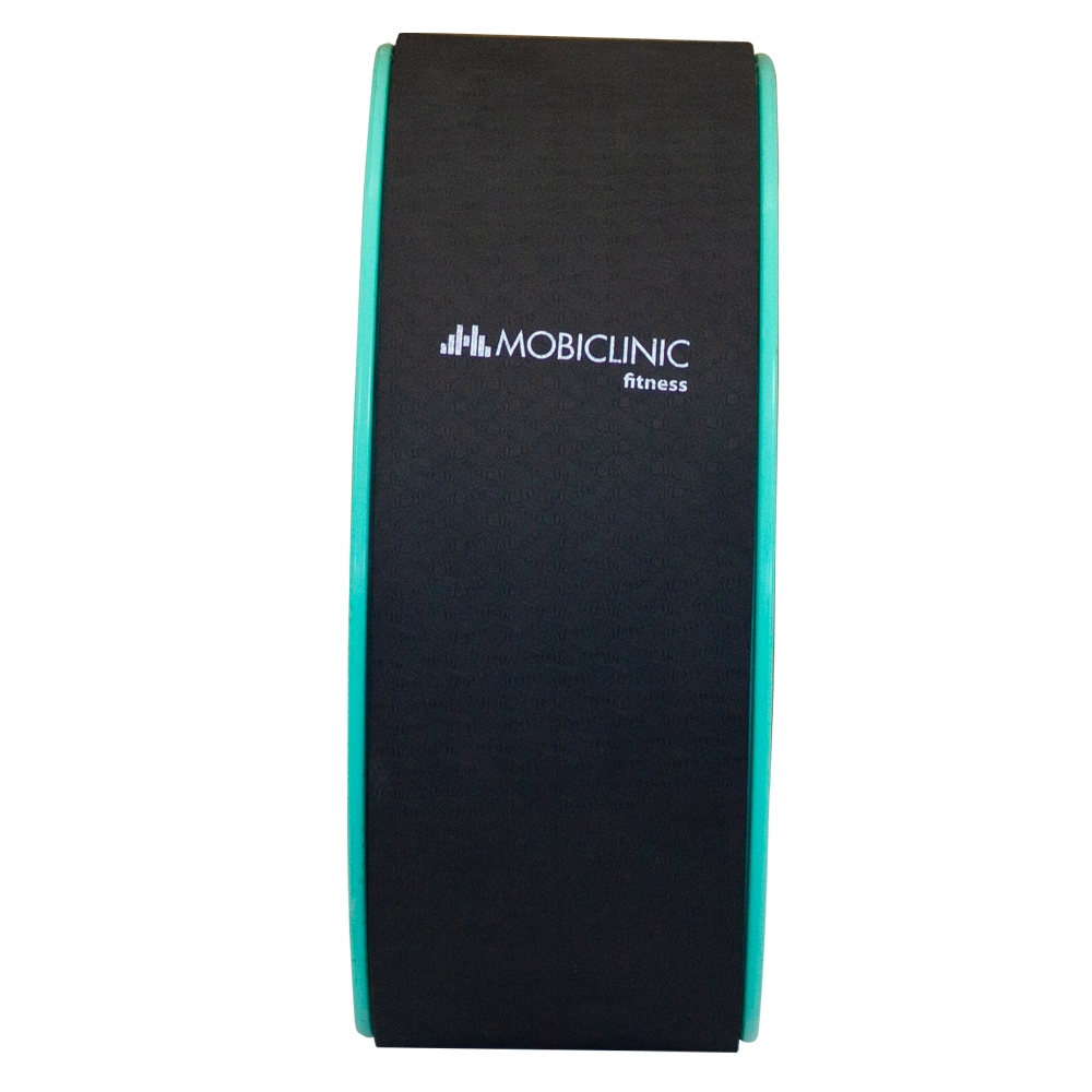 Una rueda de ejercicio negra y verde azulado. La rueda tiene un centro negro con el logotipo blanco de MOBICLINIC. El verde azulado bordea la rueda.