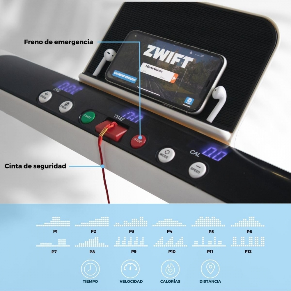Cinta de correr con teléfono mostrando la app Zwift. Botón de parada de emergencia, clip de seguridad y panel de control visibles. AirPods e indicadores de programa presentes.