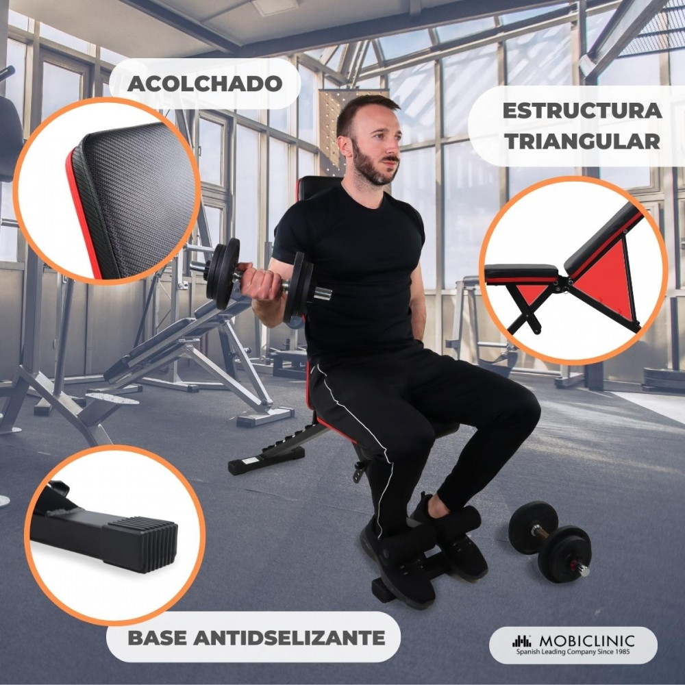 Hombre levantando pesas en un banco en un gimnasio. Detalles muestran asiento acolchado, marco triangular y base antideslizante.