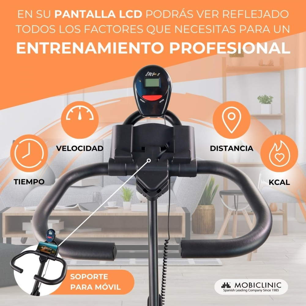 Una bicicleta estática con pantalla muestra tiempo, velocidad, distancia y calorías. Tiene un soporte para teléfono y un marco negro.