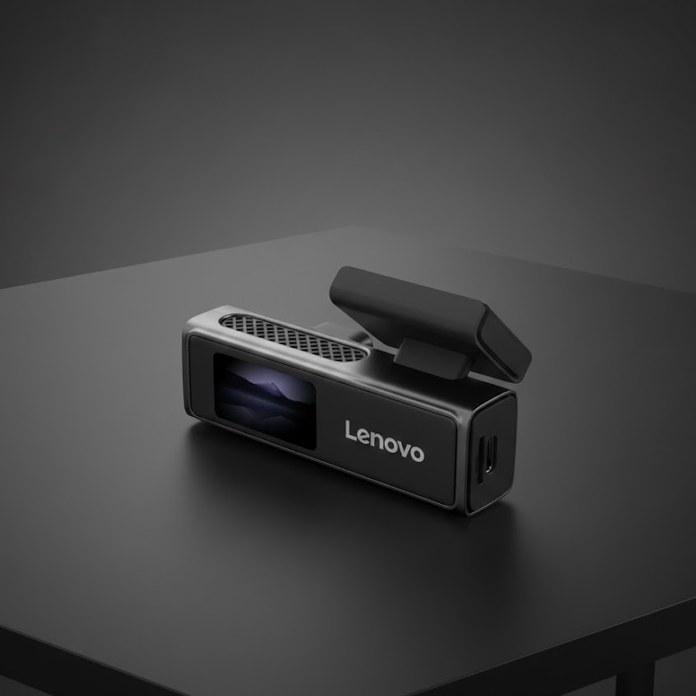 Dağ manzarası gösteren ekranlı bir Lenovo cihazı, koyu renkli bir masanın üzerinde duruyor. Cihaz siyah ve gümüş rengindedir.