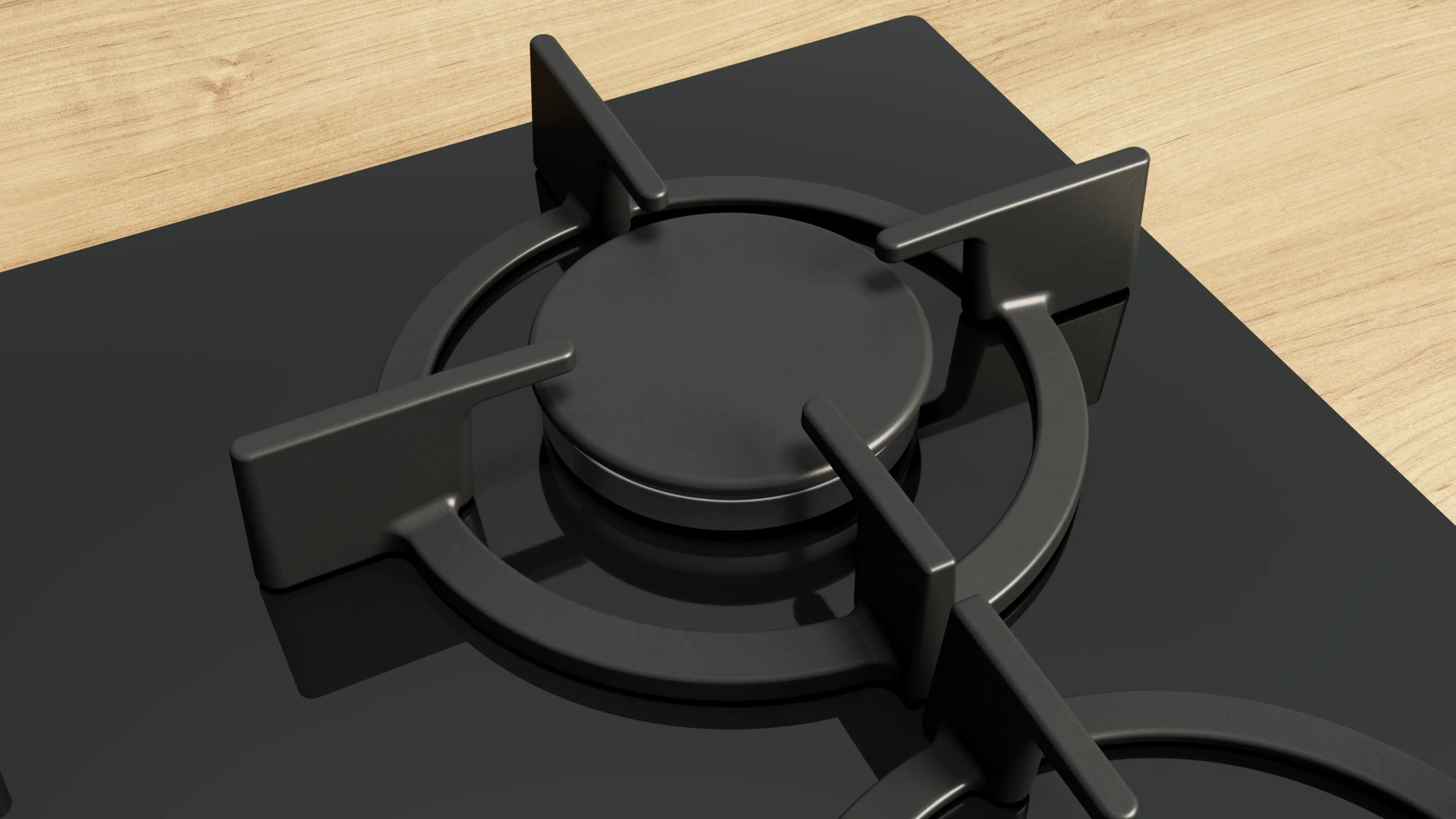 Zbliżenie czarnego palnika kuchenki gazowej na czarnej powierzchni. Jasne drewno w tle.