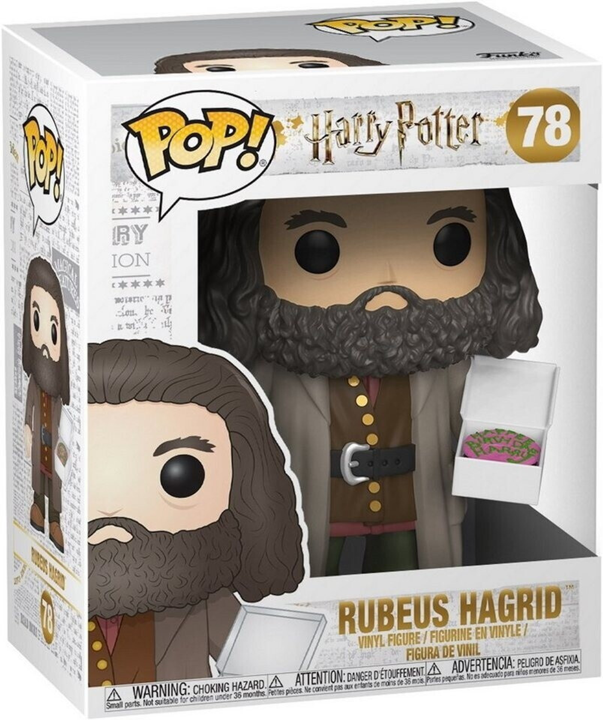 Figura Funko Pop! di Rubeus Hagrid di Harry Potter in una scatola. Hagrid tiene in mano una torta rosa. La scatola è bianca.