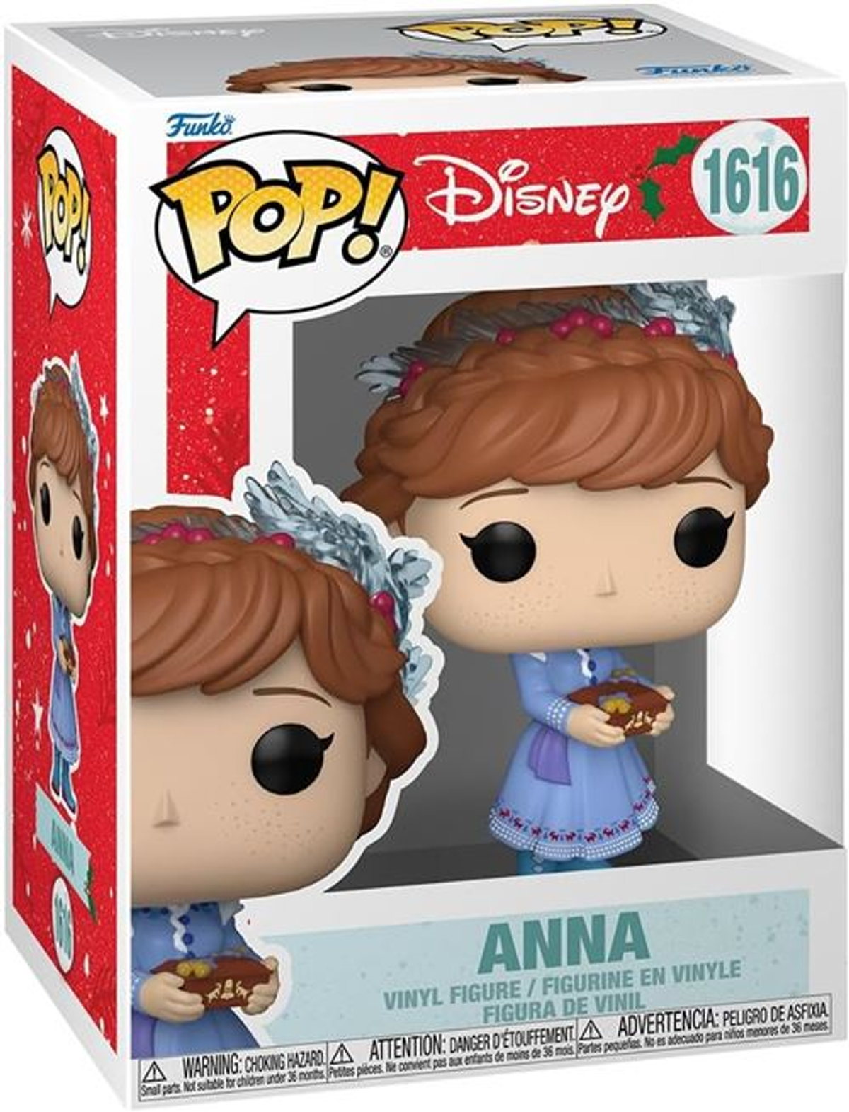 Pudełko Funko Pop z Anną z Krainy Lodu. Figurka Anny trzyma mały bochenek, ma niebieską sukienkę i świąteczną ozdobę głowy.