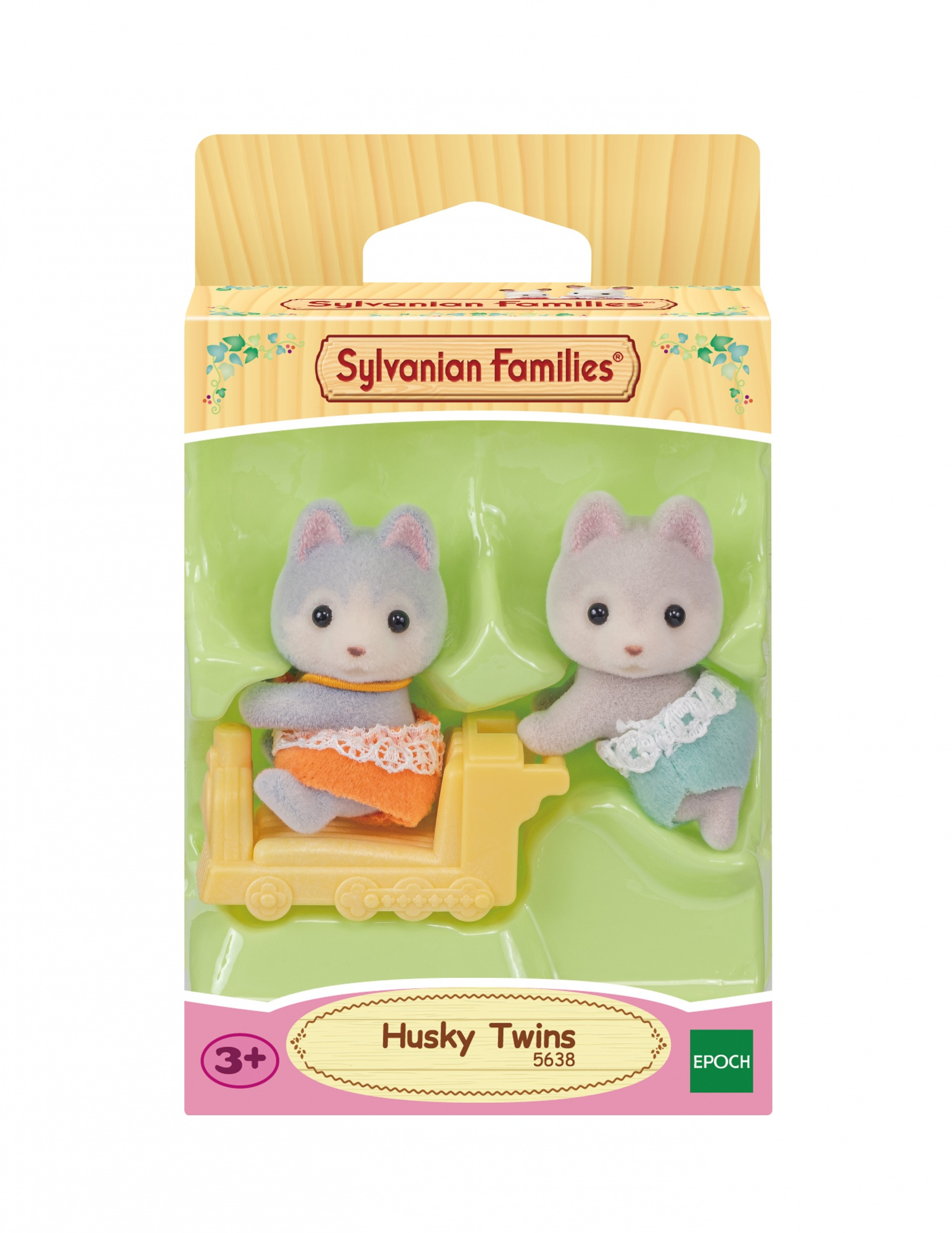 Sylvanian Families Husky Twins Spielset. Zwei Husky-Figuren in Windeln, eine auf einem gelben Zugwagen. Verpackt.