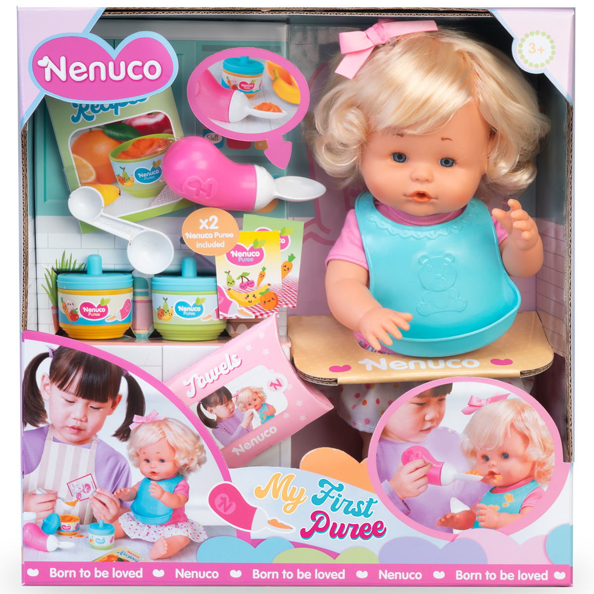 Una muñeca Nenuco con lazo rosa, babero azul y accesorios para hacer comida. La caja dice 'My First Puree'.