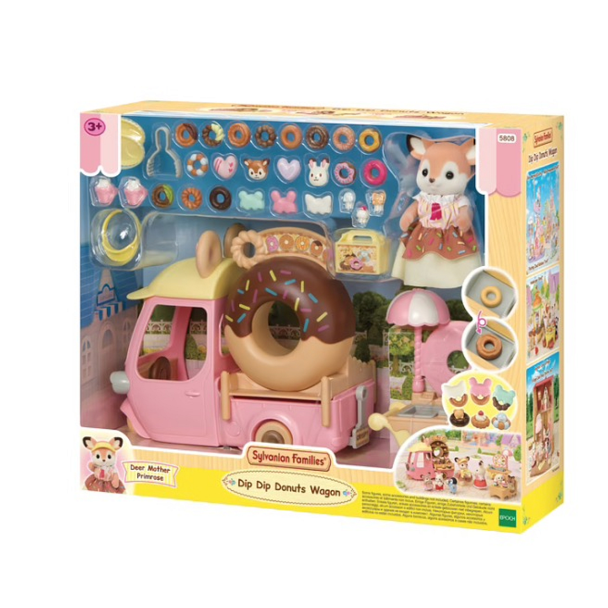 Un juego de juguetes Sylvanian Families Dip Dip Donuts Wagon. Incluye un camión rosa, rosquillas, una figura de ciervo y varios accesorios.