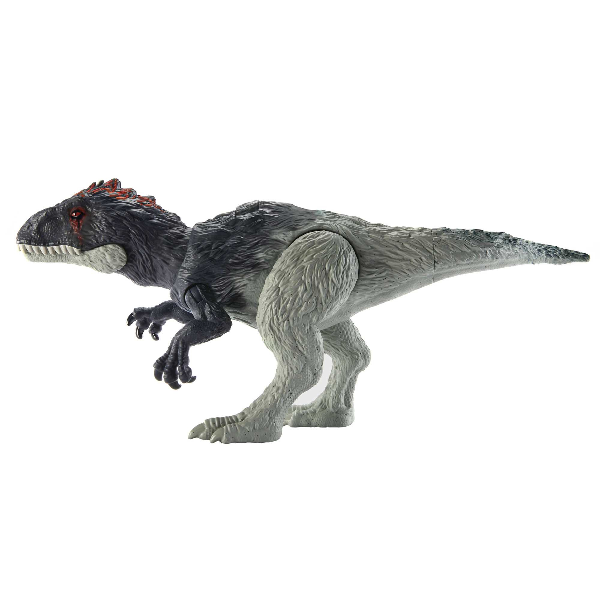 Un juguete de dinosaurio gris y negro con detalles rojos, sobre fondo blanco. De pie sobre dos patas.