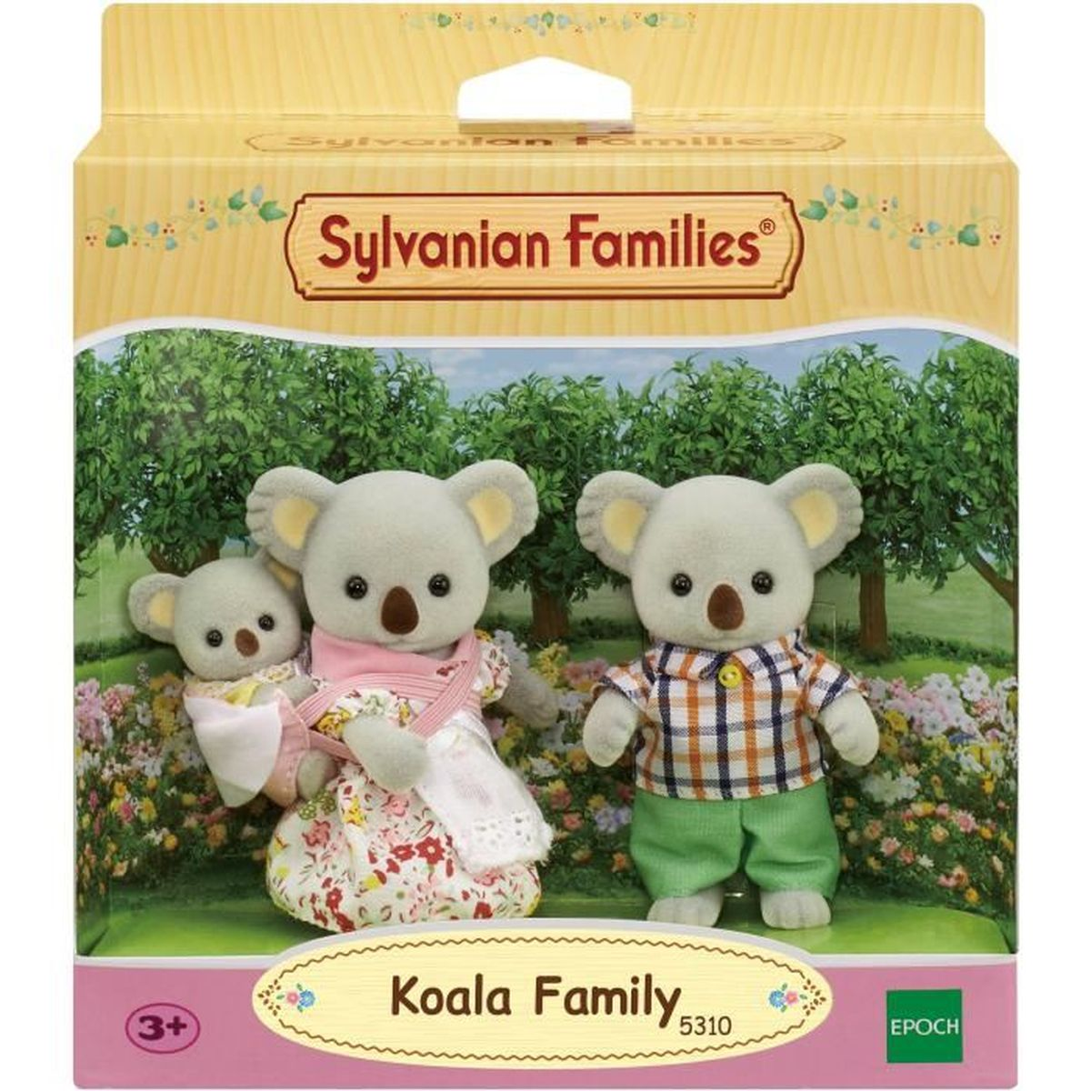 Juego de juguetes de la familia Koala. Incluye tres figuras de koala en una caja con un fondo de árboles y flores. La caja es amarilla y rosa.