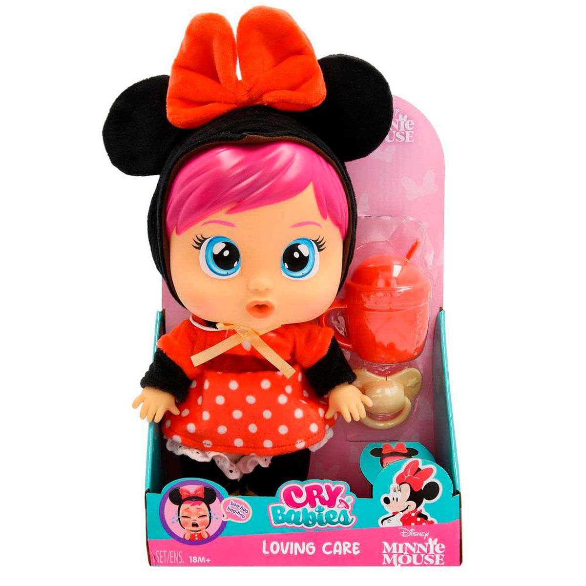 Una muñeca de Minnie Mouse con un vestido rojo y blanco de lunares, orejas negras y lazo. Está en una caja con una taza y un chupete.