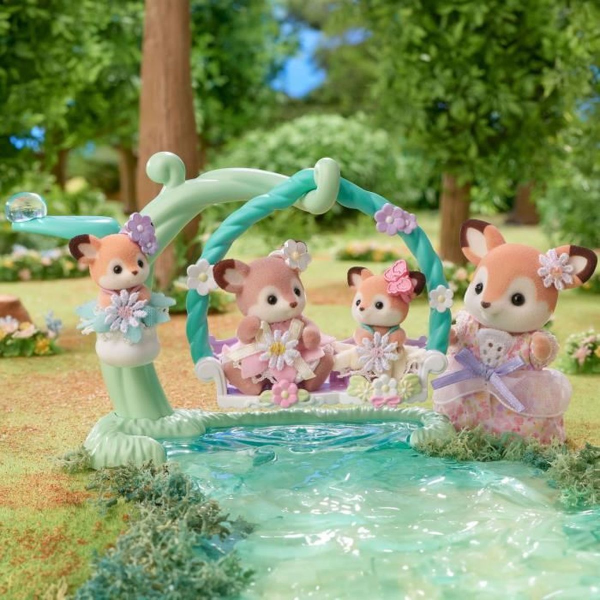 Cuatro figuras de ciervos con vestidos en un columpio sobre un arroyo. El fondo muestra árboles y cielo azul, creando una escena de jardín.