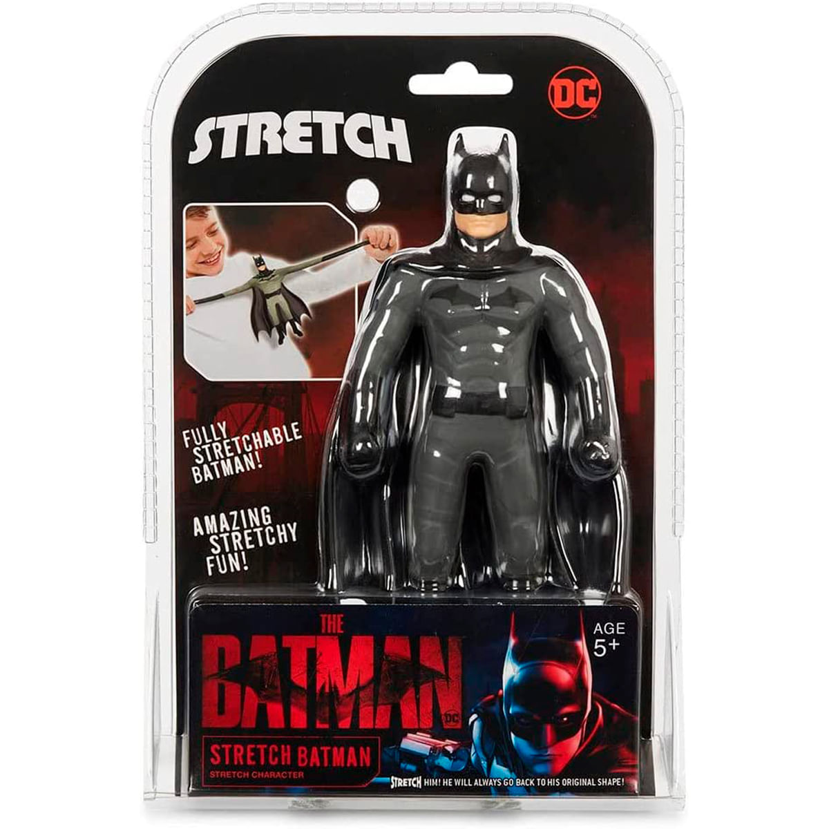 Un juguete de Batman Stretch en un paquete de plástico transparente. El paquete muestra a un niño estirando un Batman más pequeño y el logotipo de Batman.