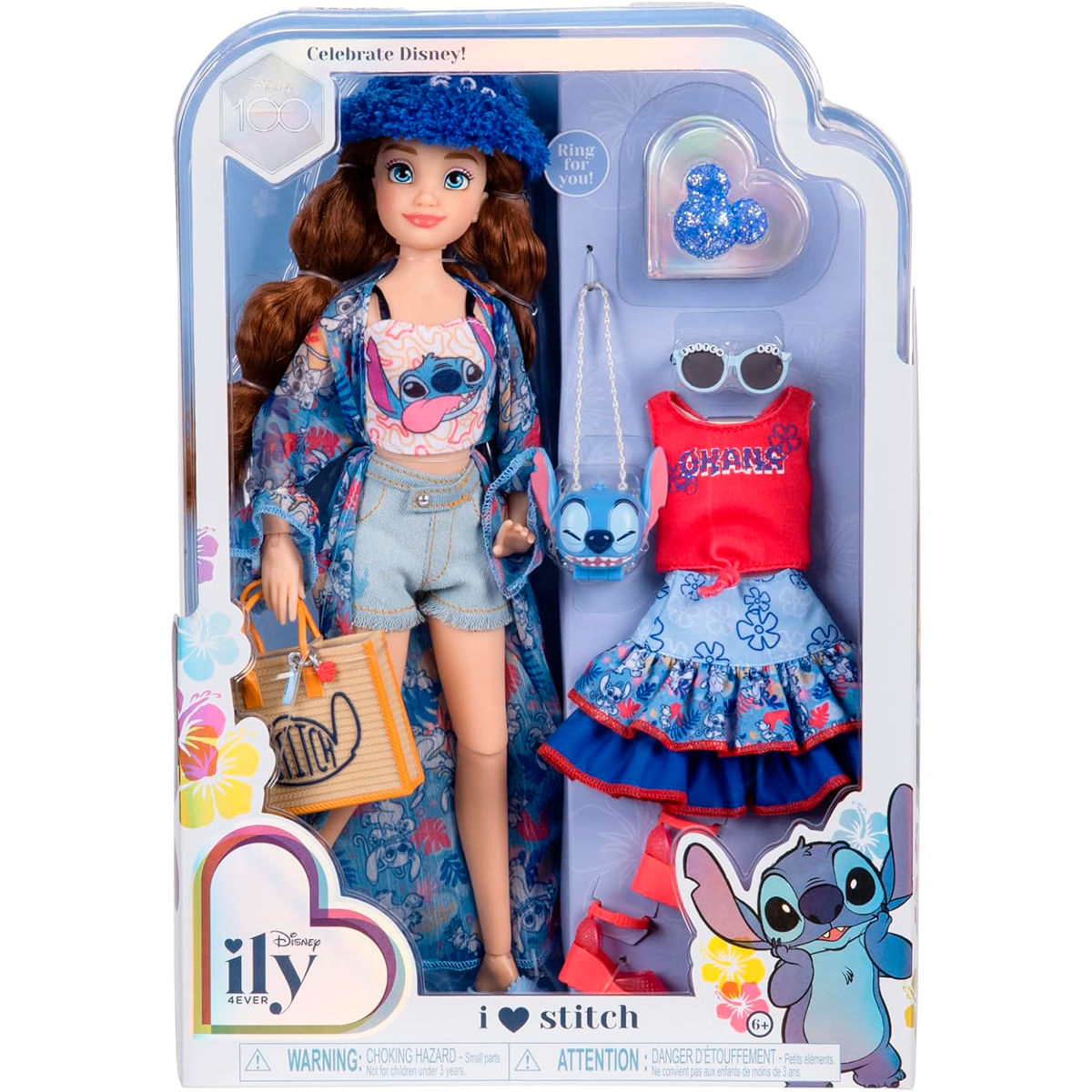 Una muñeca Disney iLY 4EVER en un paquete. La muñeca tiene pelo largo, atuendo azul y accesorios. También hay un atuendo extra.