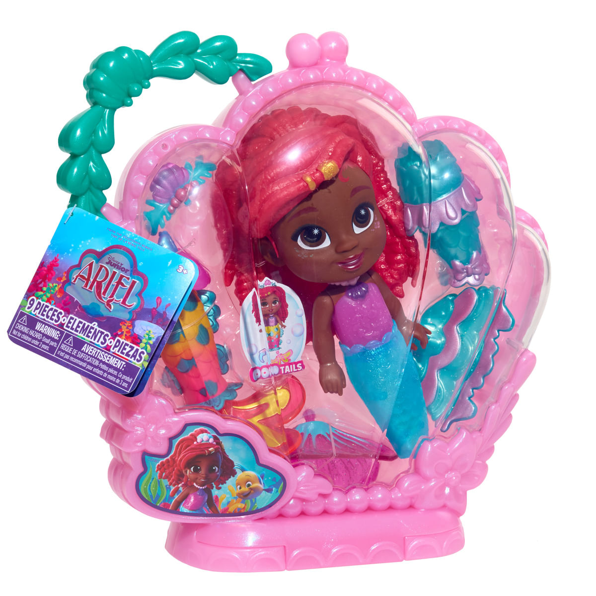 Muñeca Ariel en un estuche rosa con forma de concha. La muñeca tiene pelo rojo, cola azul y top morado. Incluye accesorios.