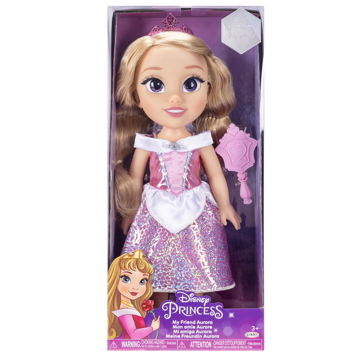 Una muñeca de la Princesa Disney, Aurora, en una caja. Lleva un vestido rosa y una corona, sosteniendo un espejo rosa.